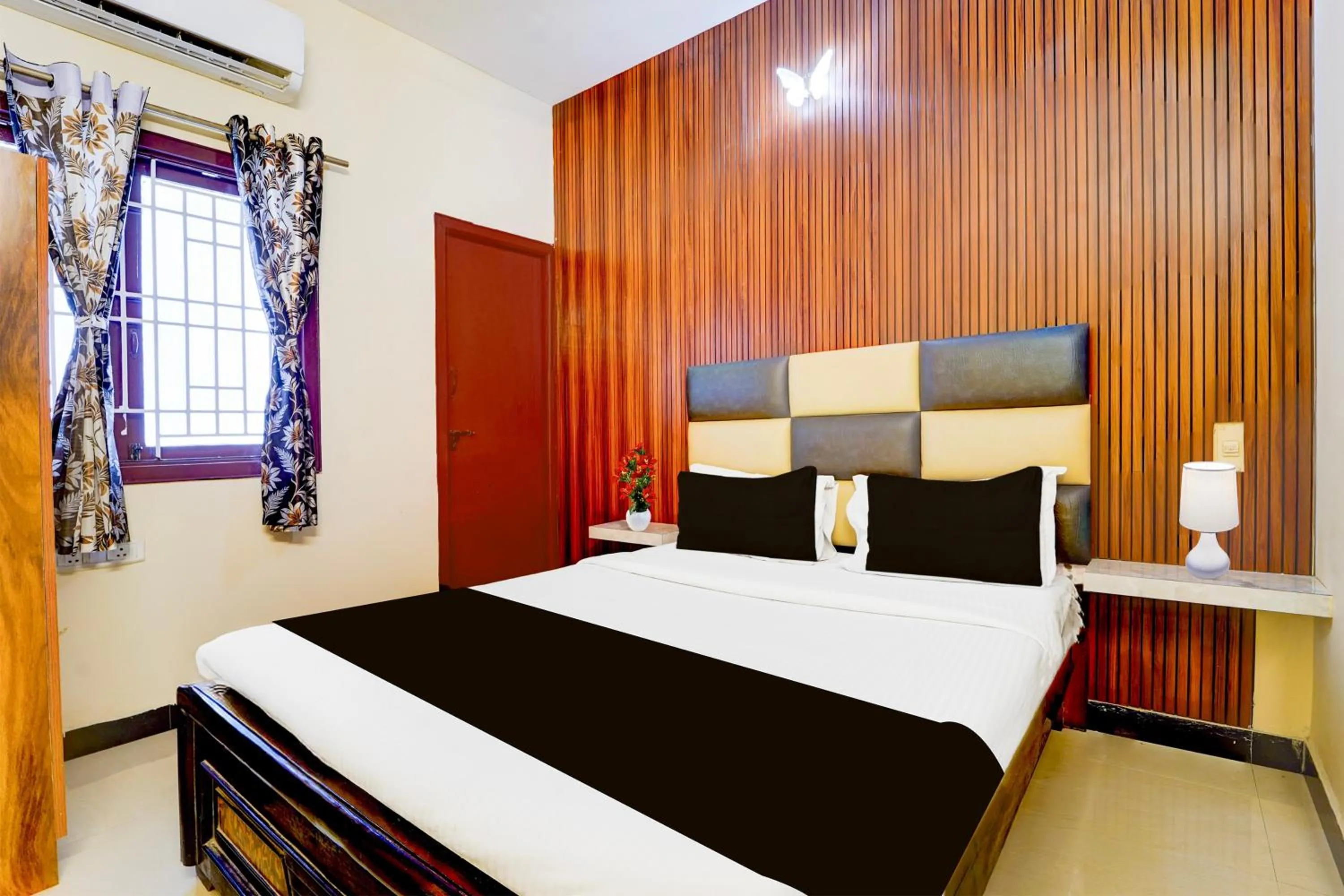 Bedroom in Hotel O Singanallur Railway Junction Formerly 2D Residency