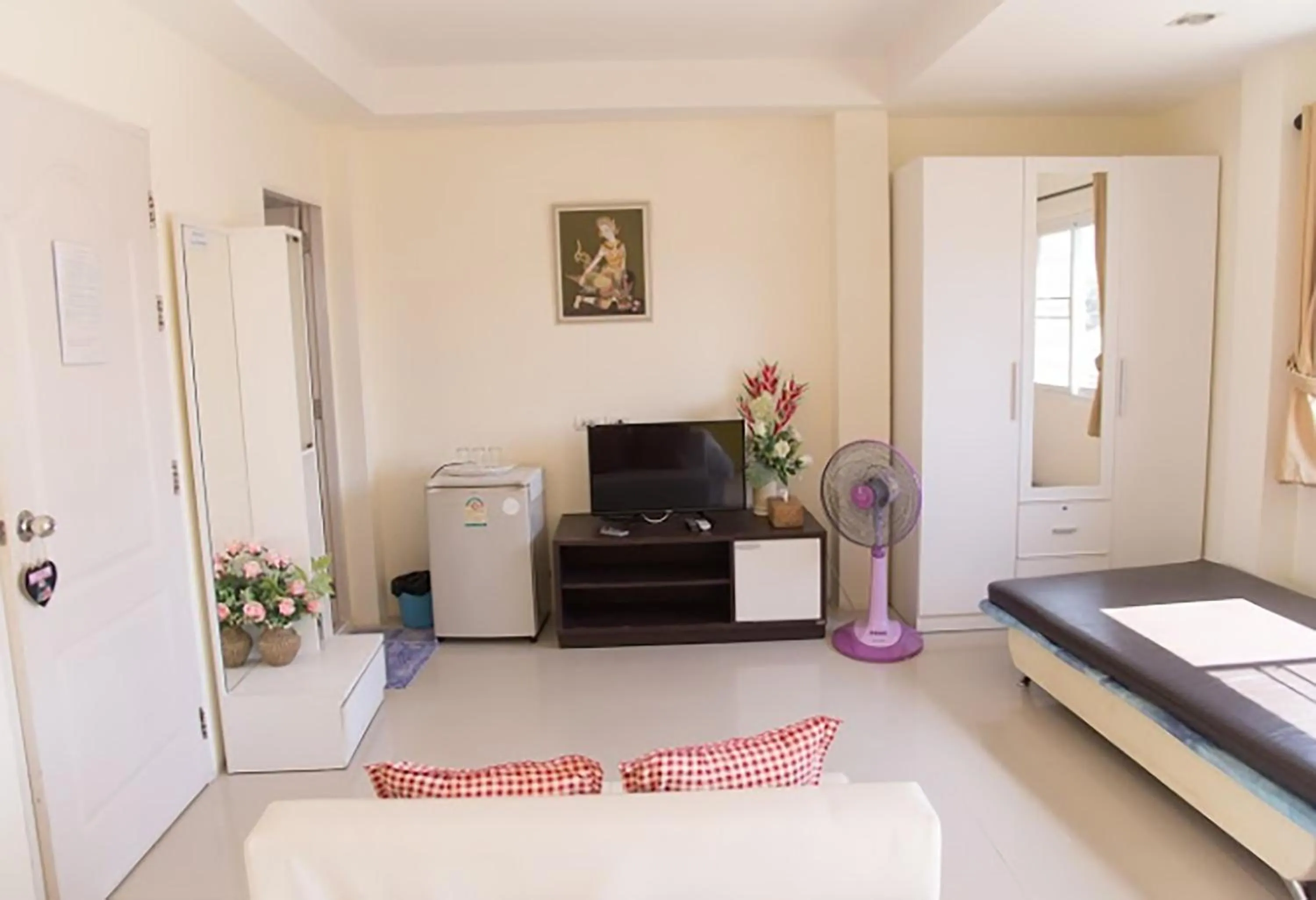 Seating area, Bed in Lotus Suite Hua Hin