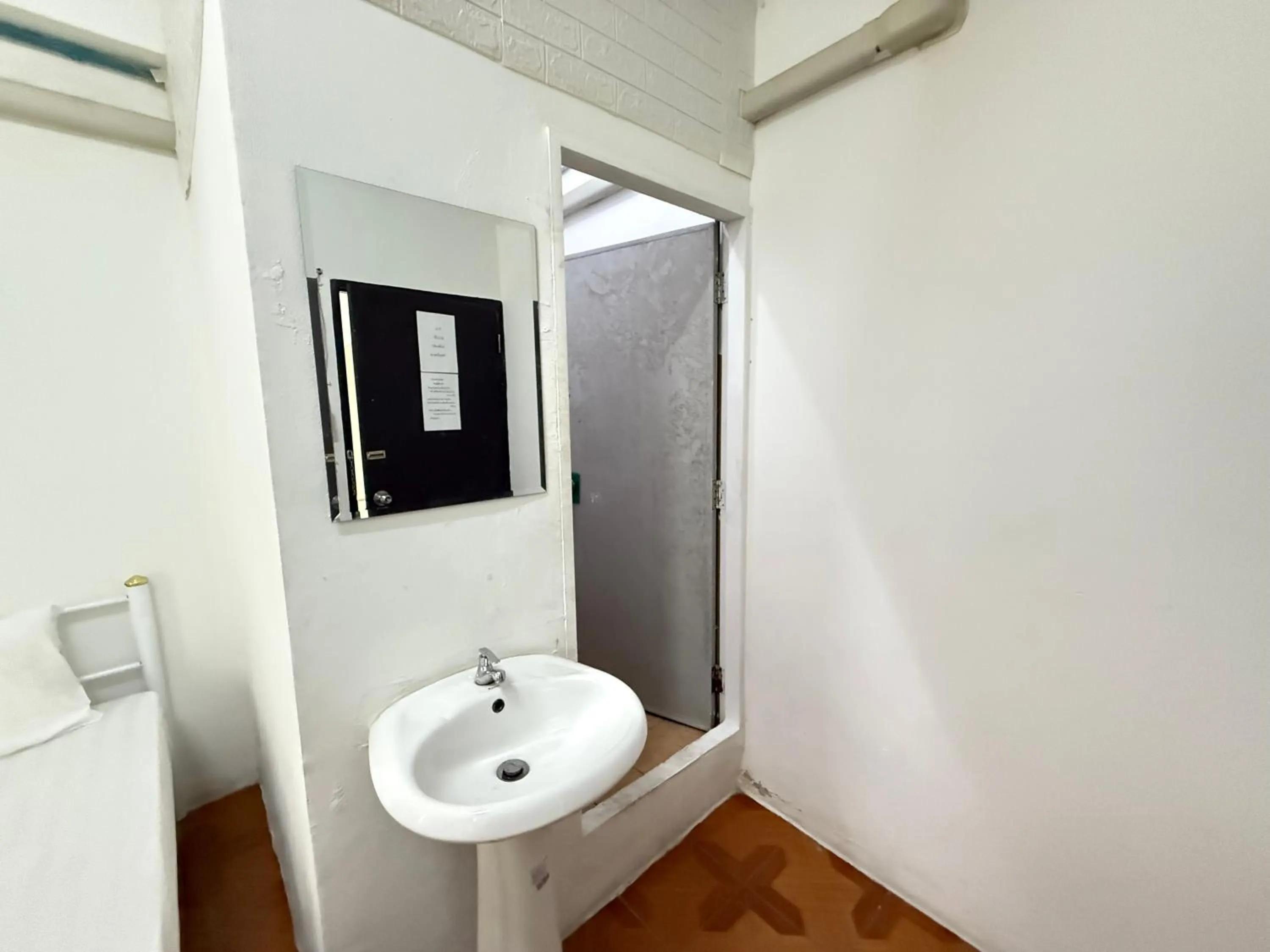 Bathroom in Happyland Guesthouse