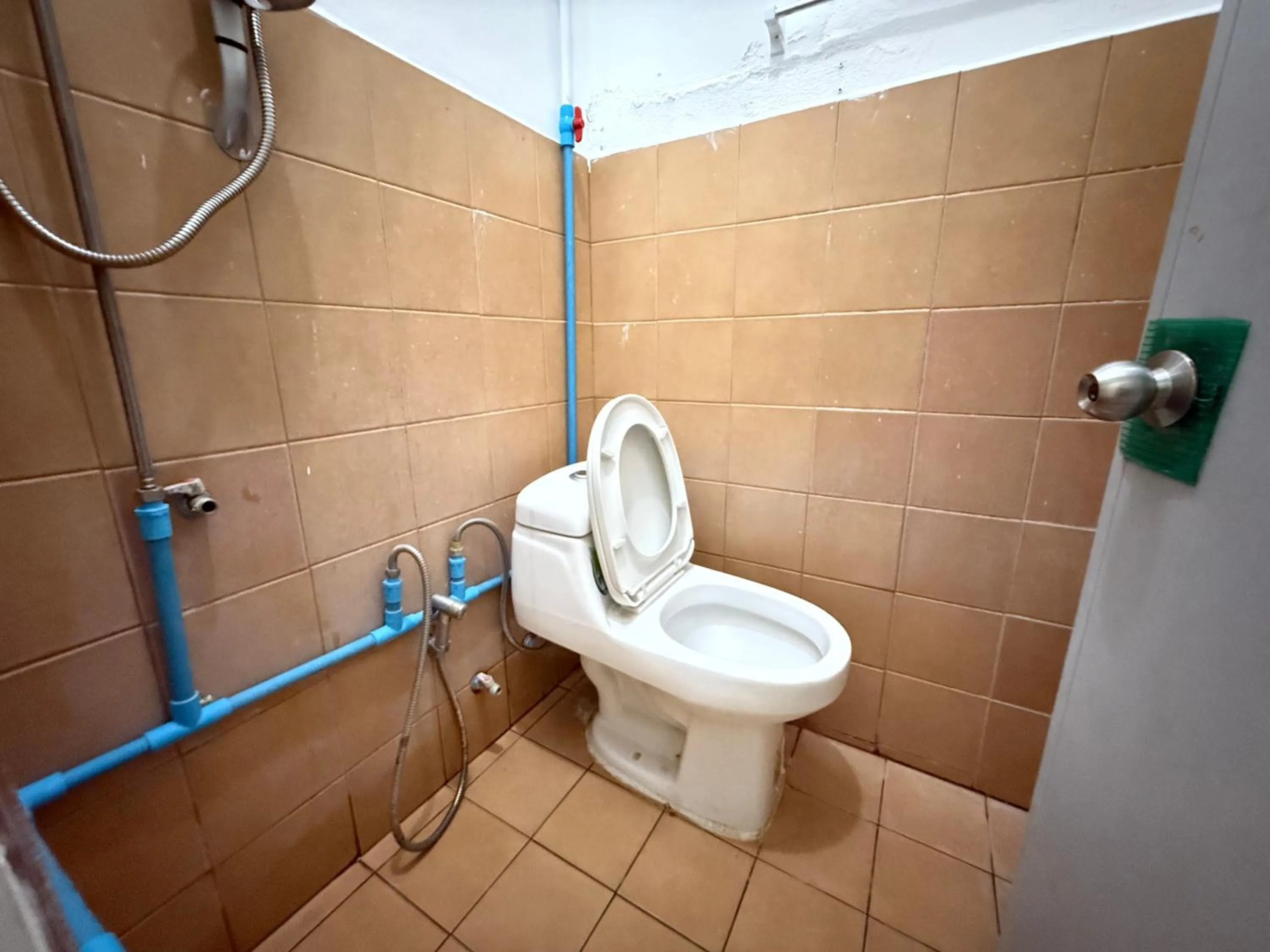 Bathroom in Happyland Guesthouse