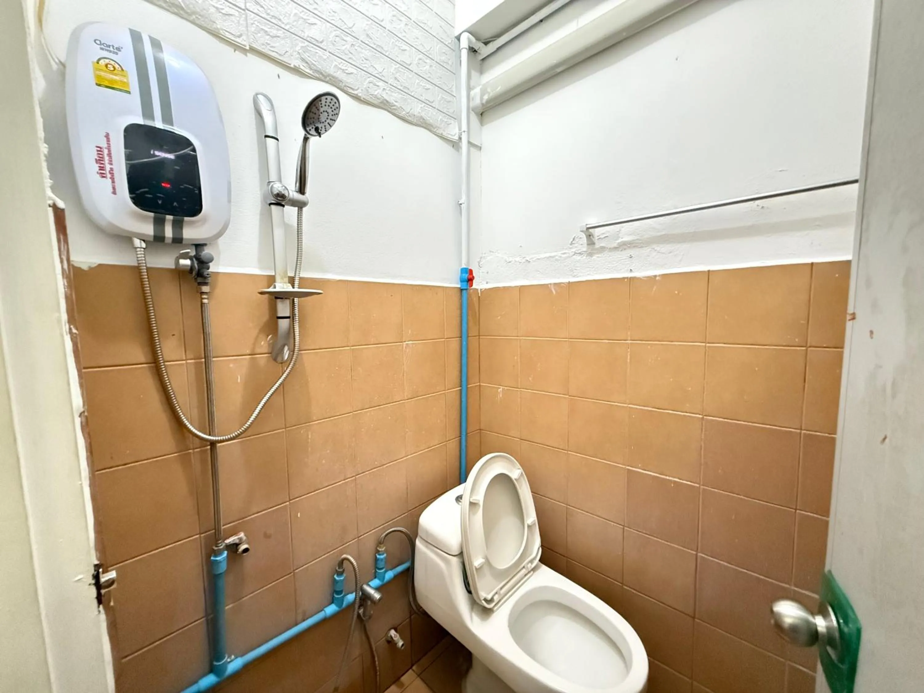 Bathroom in Happyland Guesthouse