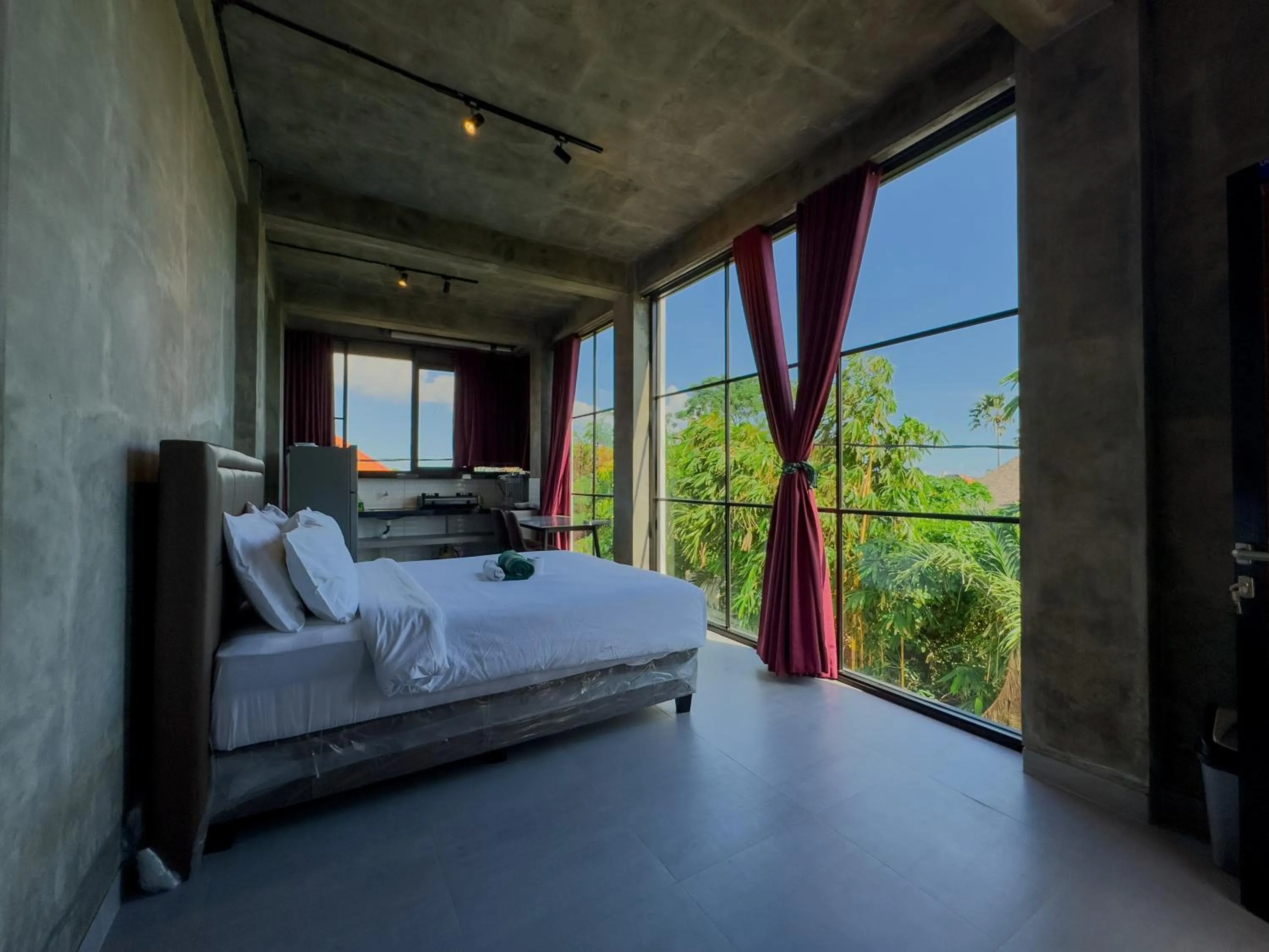 Bed in Sky Apartments and Suites