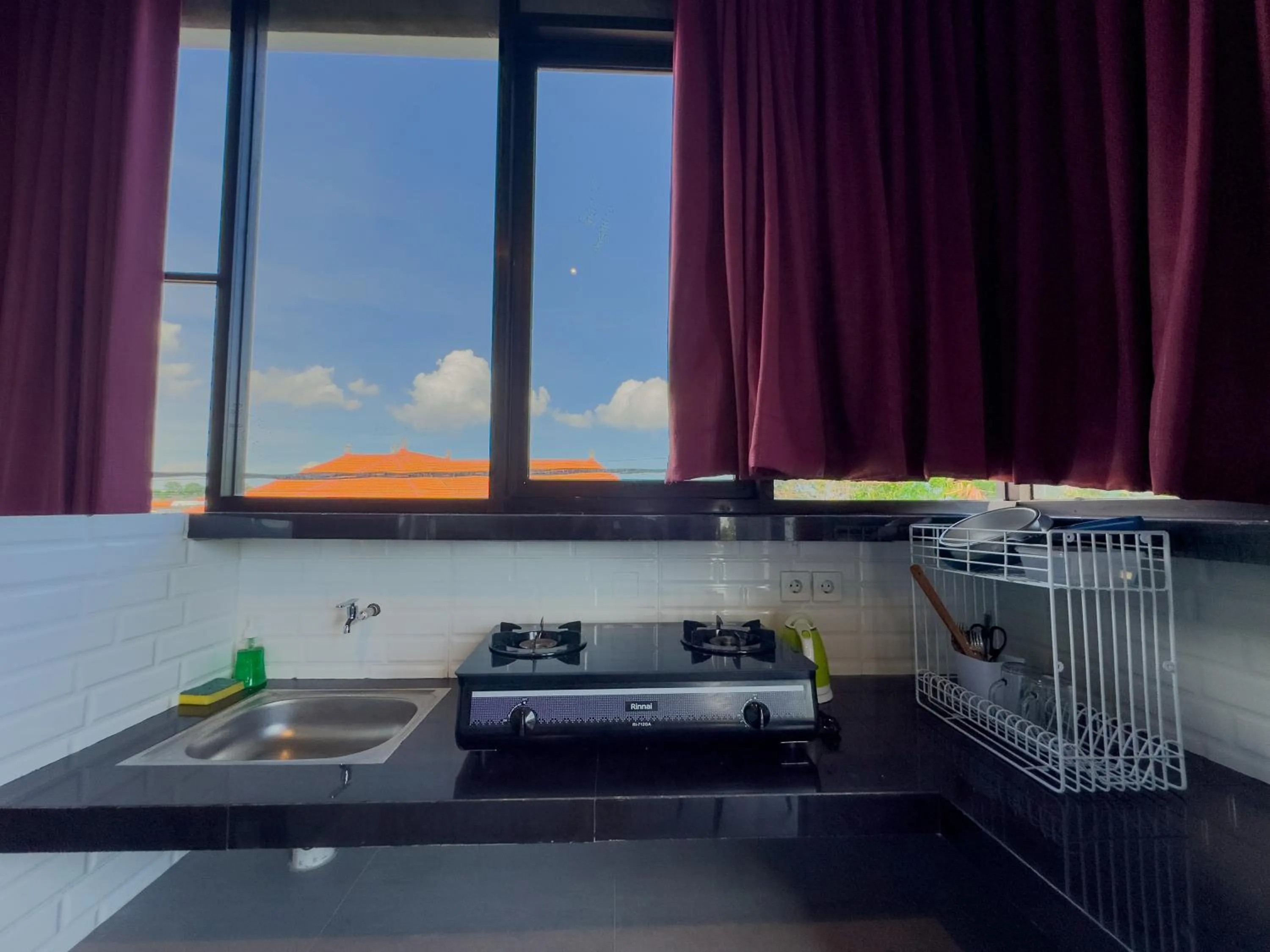 Kitchen or kitchenette in Sky Apartments and Suites