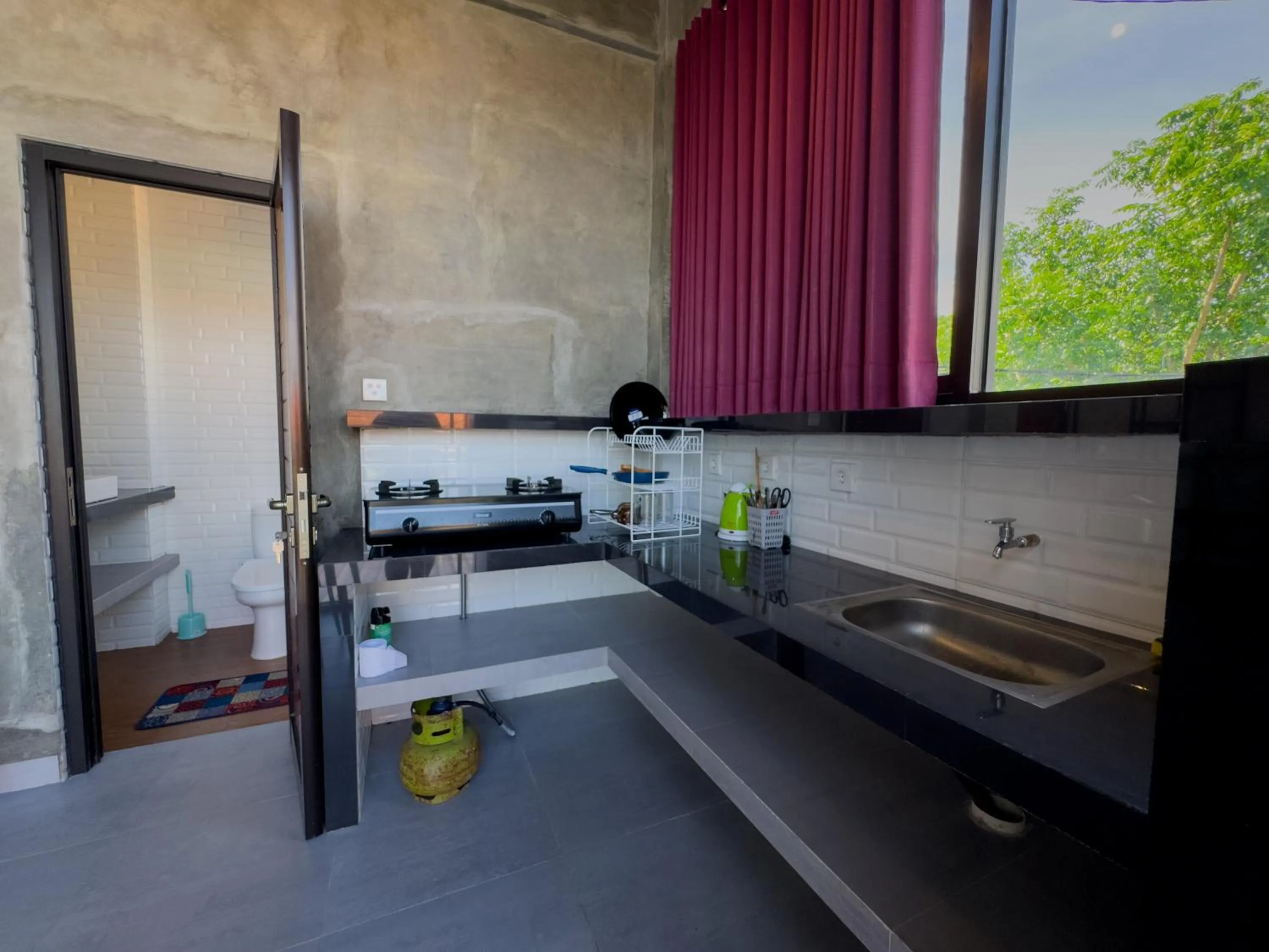 Kitchen or kitchenette in Sky Apartments and Suites