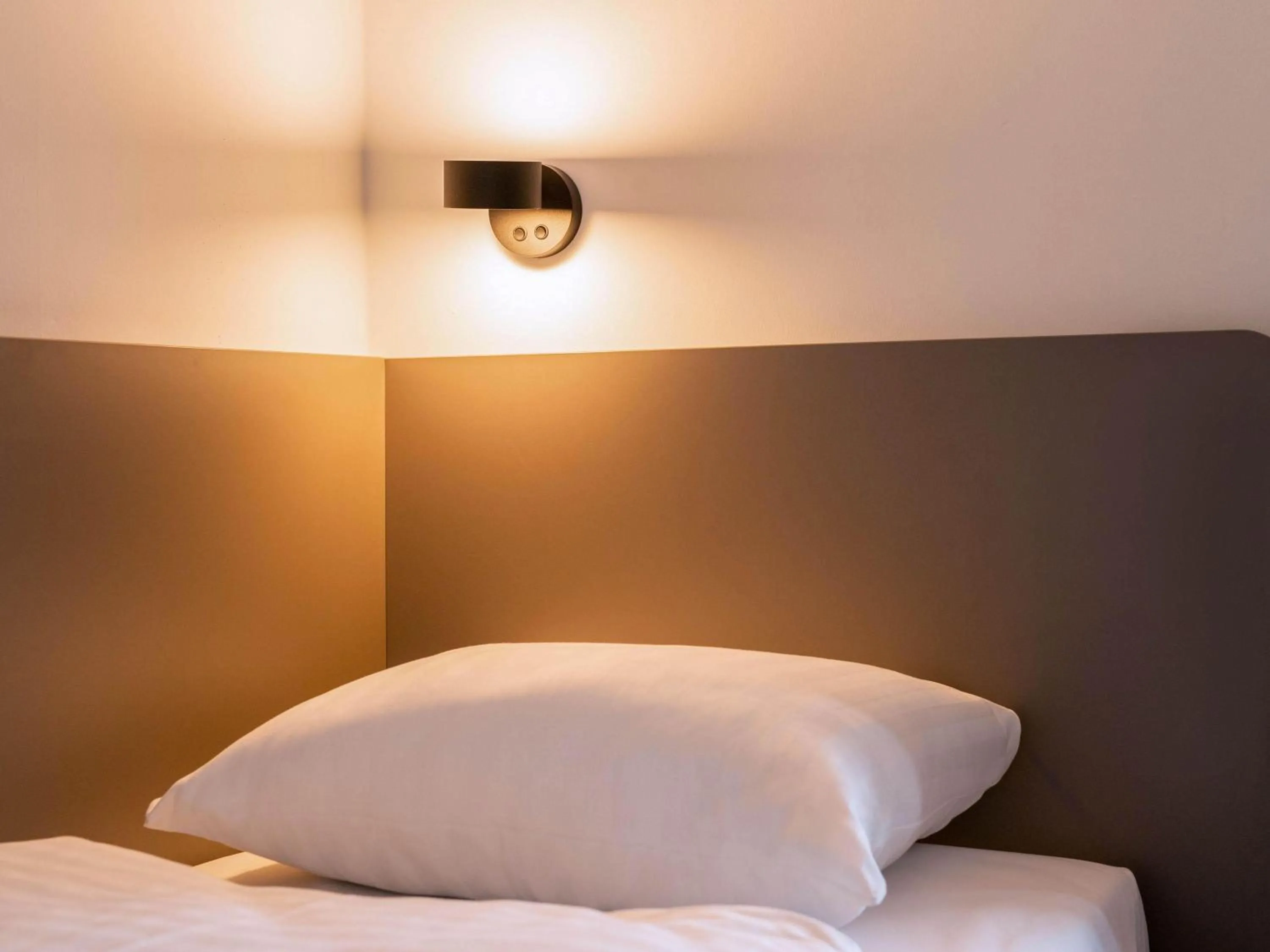 Photo of the whole room, Bed in B&B HOTEL Klagenfurt-City