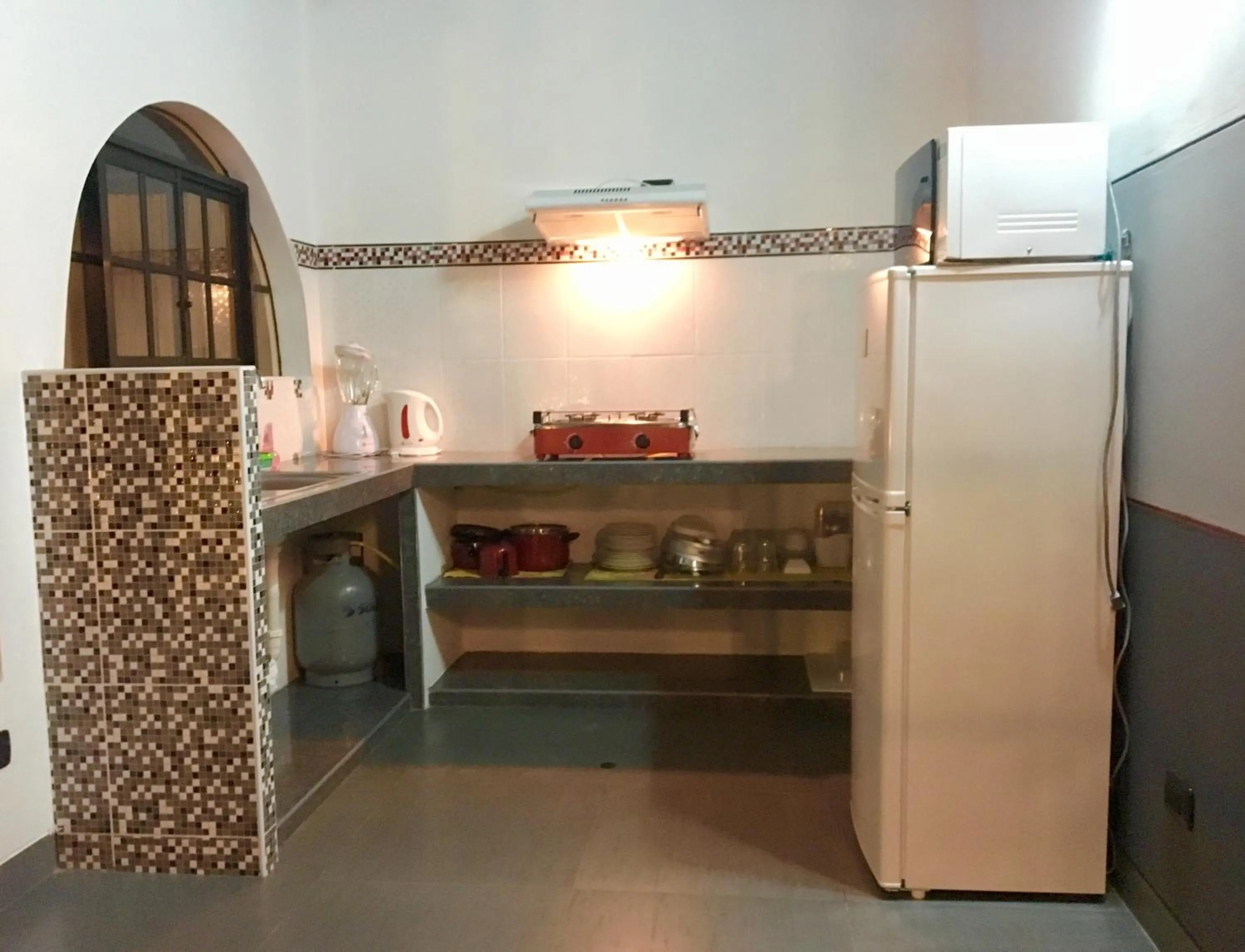 Communal kitchen in Hotel Casa Playa Zorritos