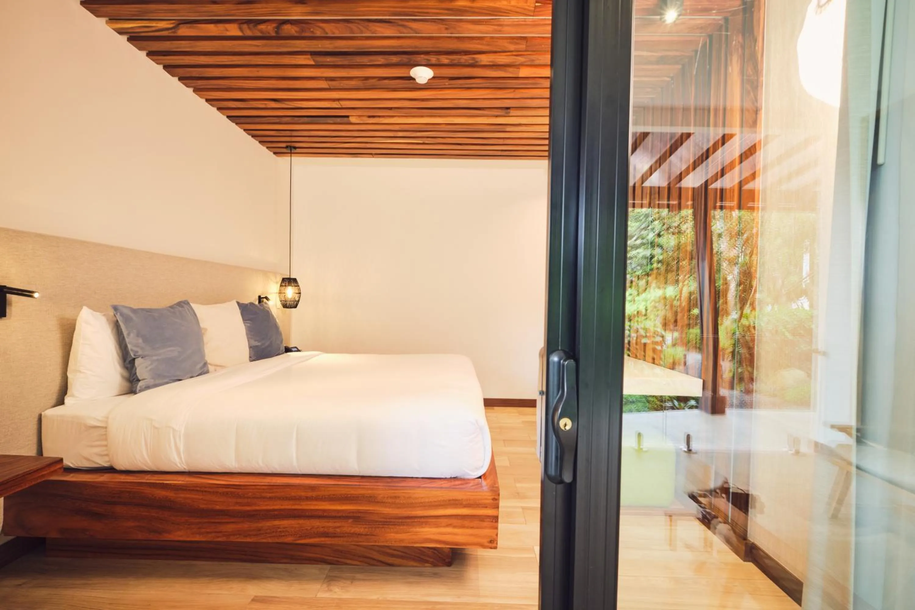 Bed in Ocotea Boutique Hotel