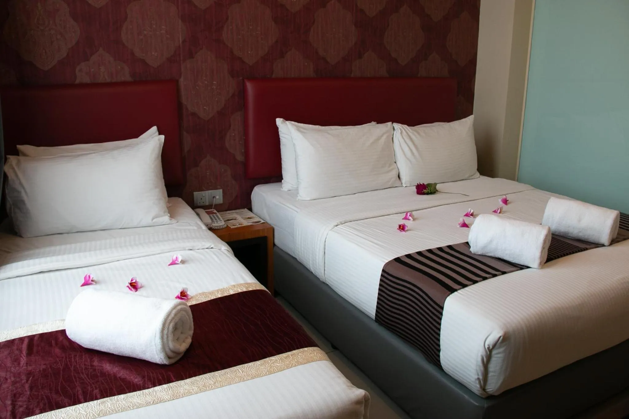 Bed in Prince 33 Hotel