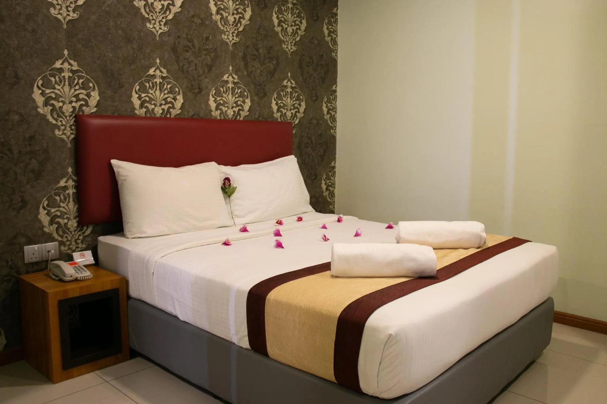 Bed in Prince 33 Hotel