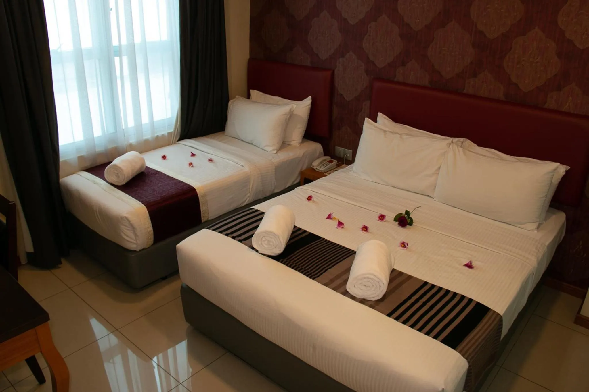 Bed in Prince 33 Hotel