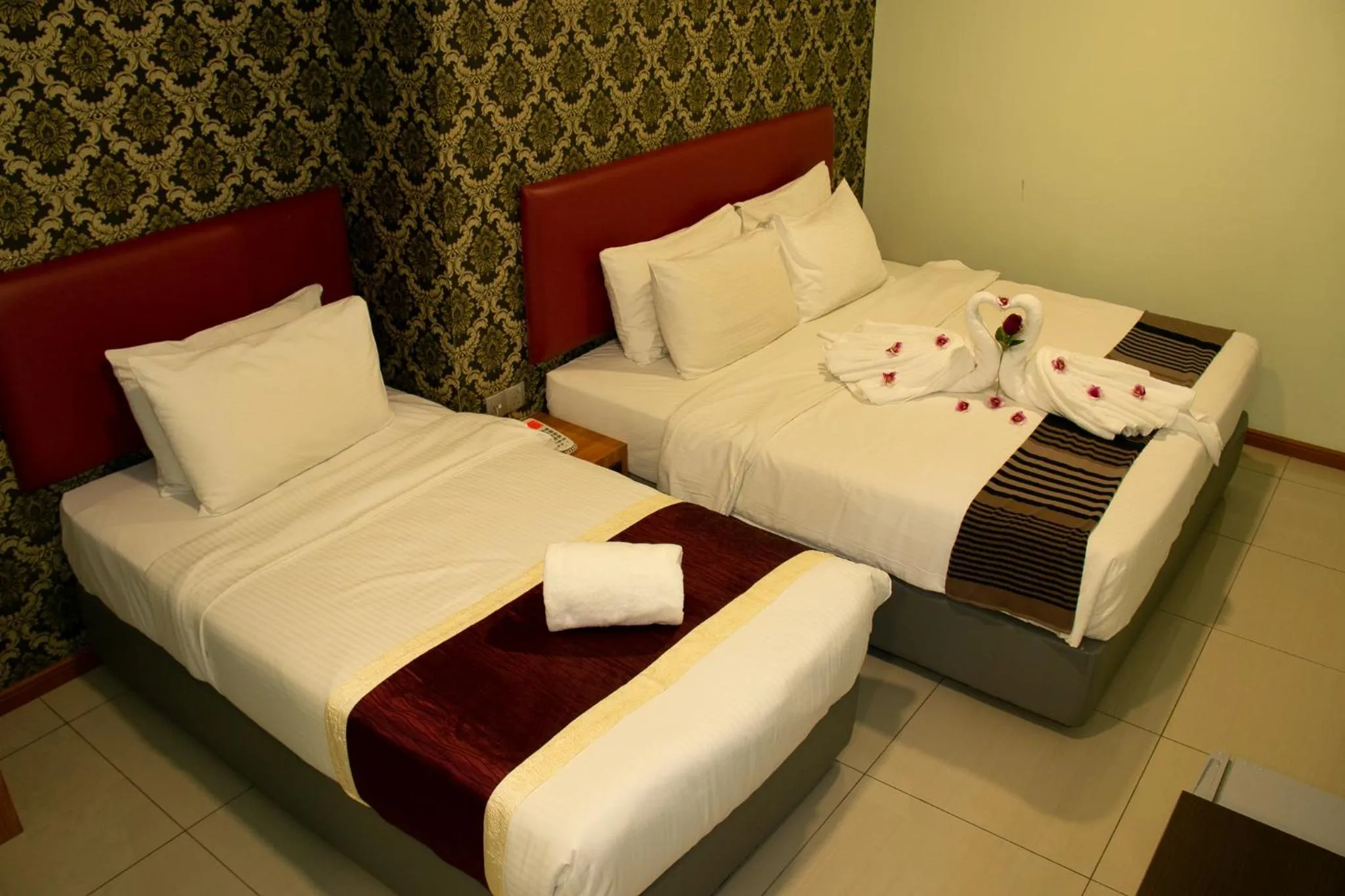 Bed in Prince 33 Hotel