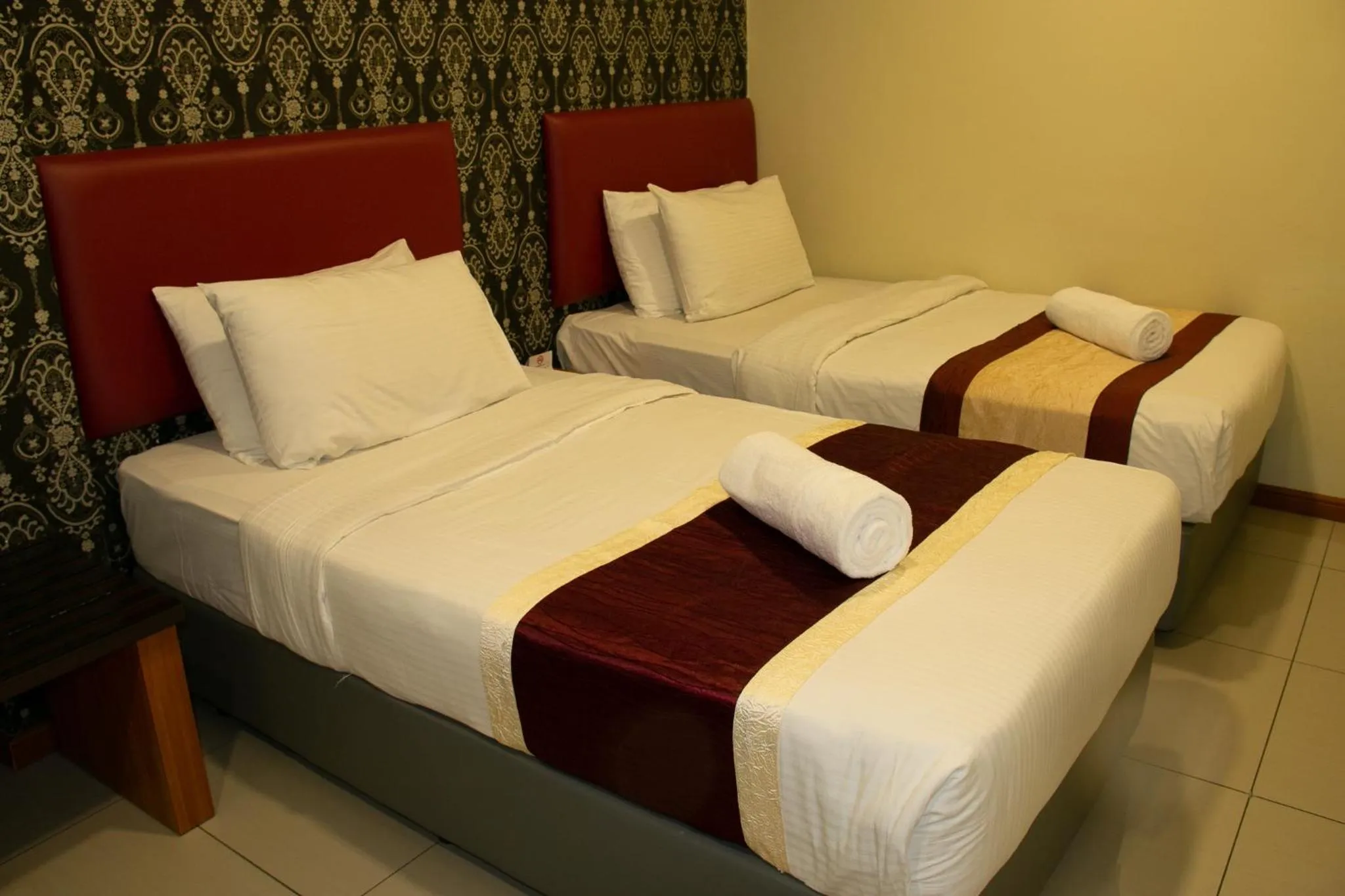 Bed in Prince 33 Hotel