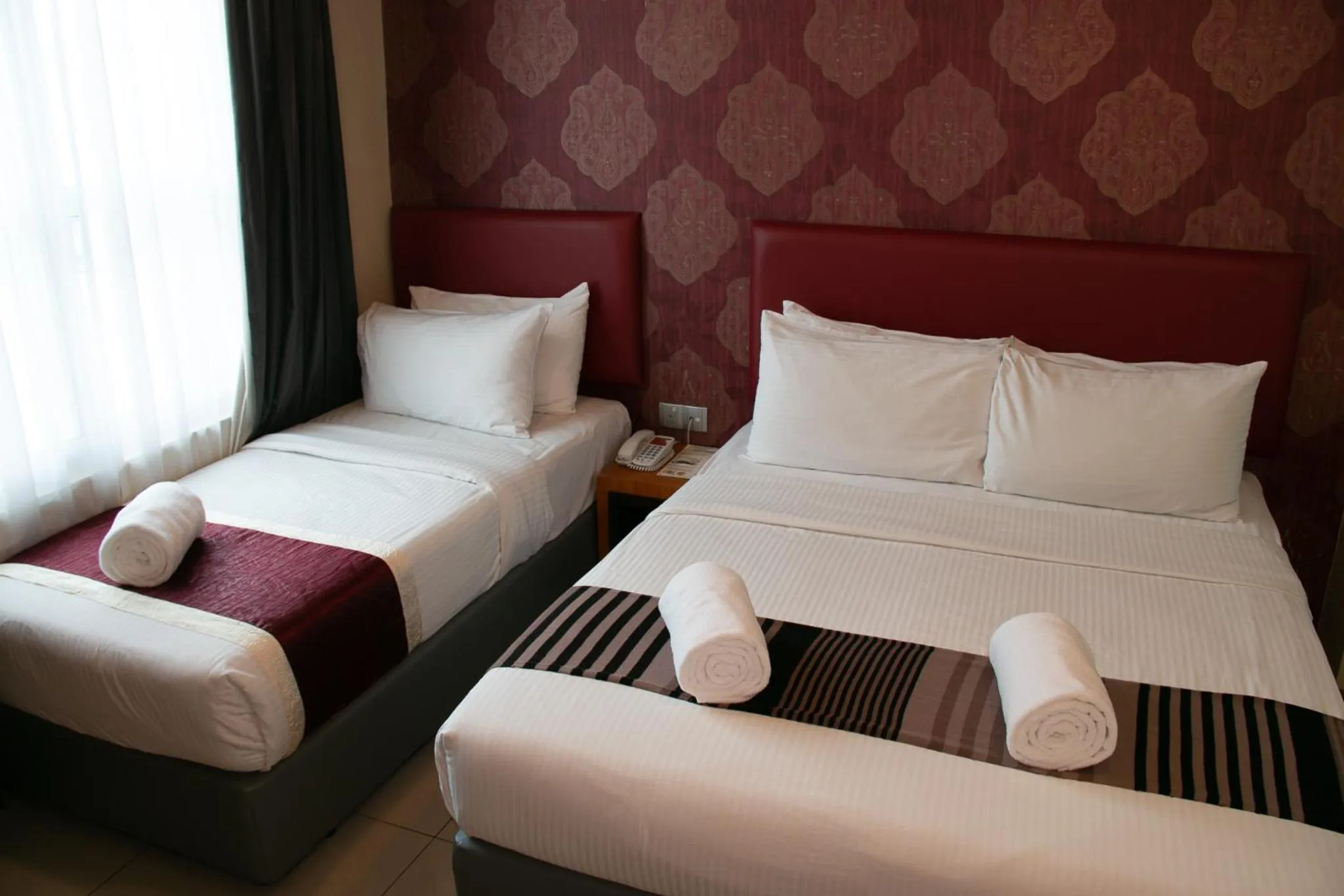 Bed in Prince 33 Hotel