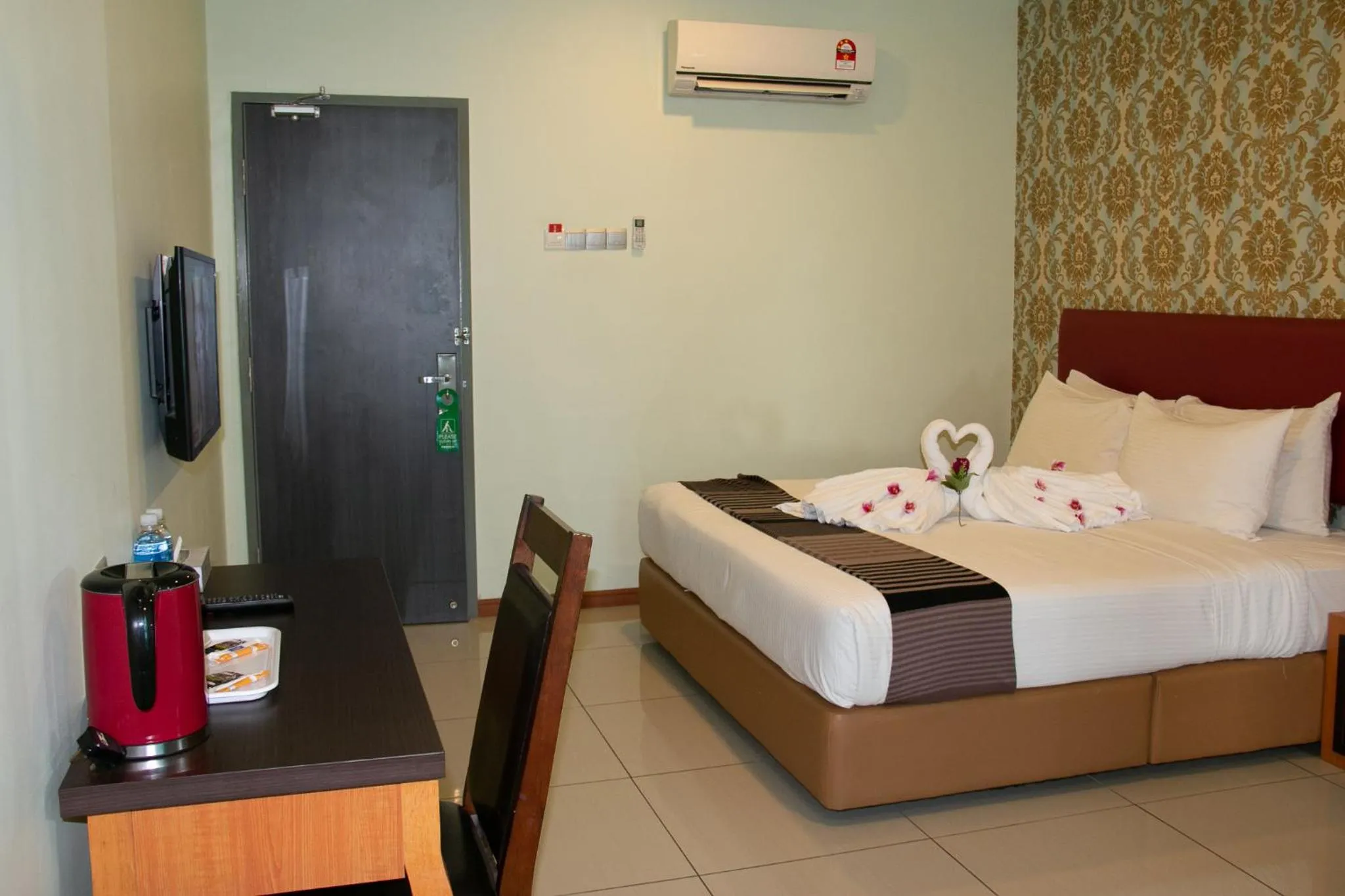 Bed in Prince 33 Hotel