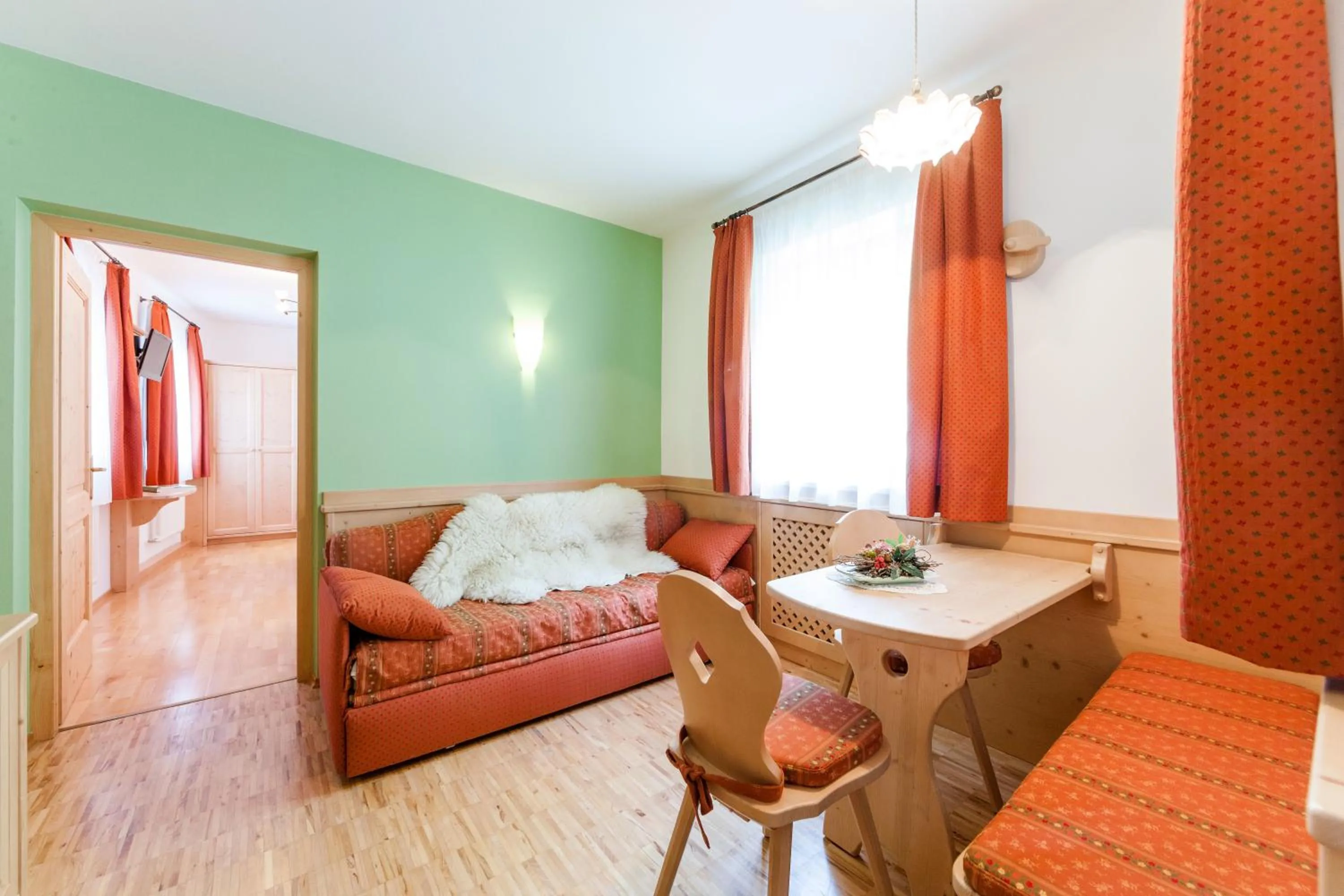 Seating area in Berggasthof Locanda Alpina Dorfner