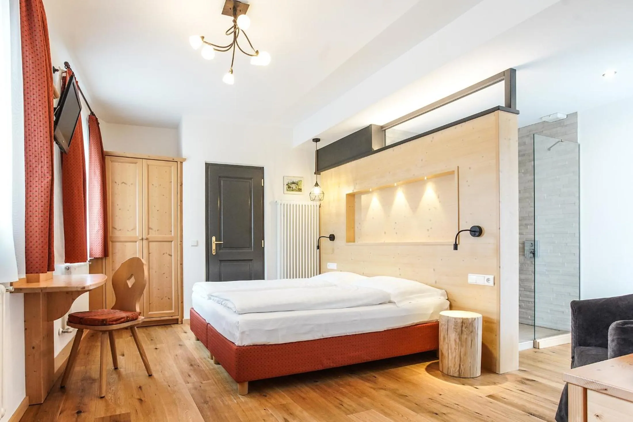 Bed in Berggasthof Locanda Alpina Dorfner