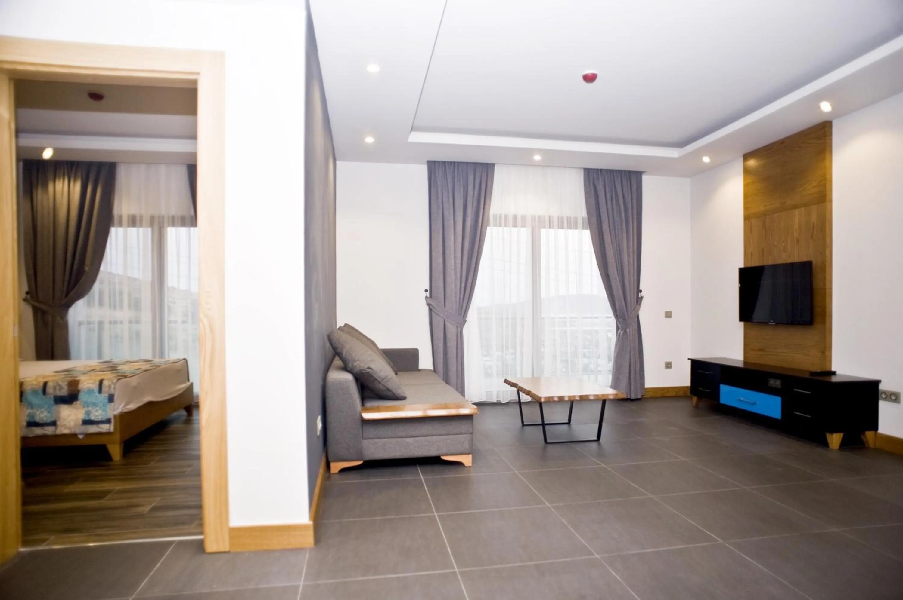 Bed in Degirmenburnu Residence