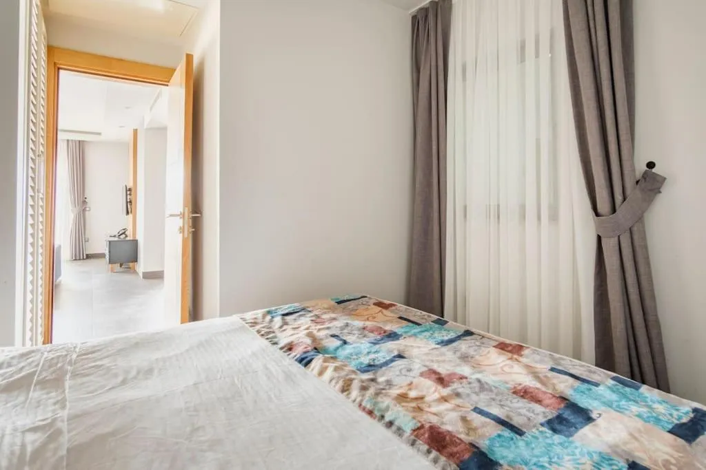 Bed in Degirmenburnu Residence