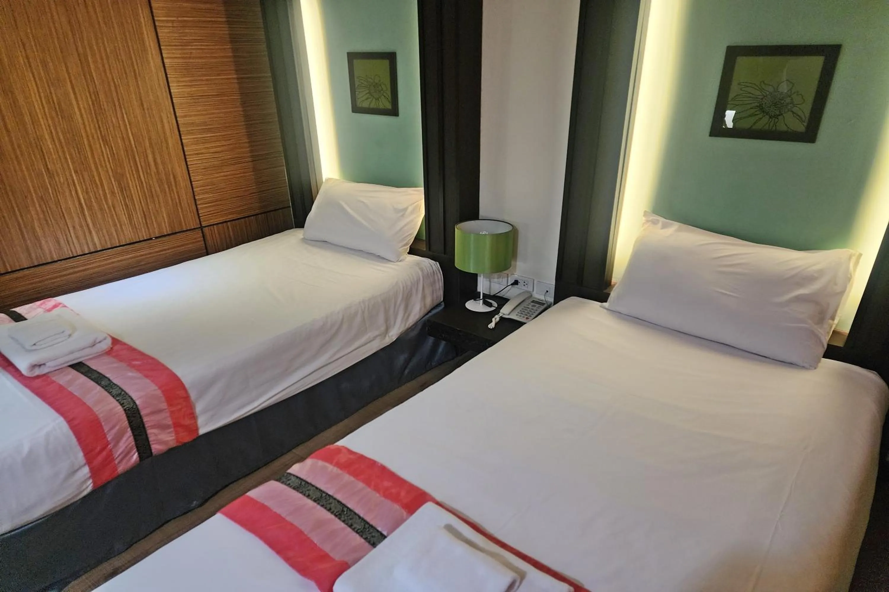 Bed in Suan Sunandha Palace Hotel