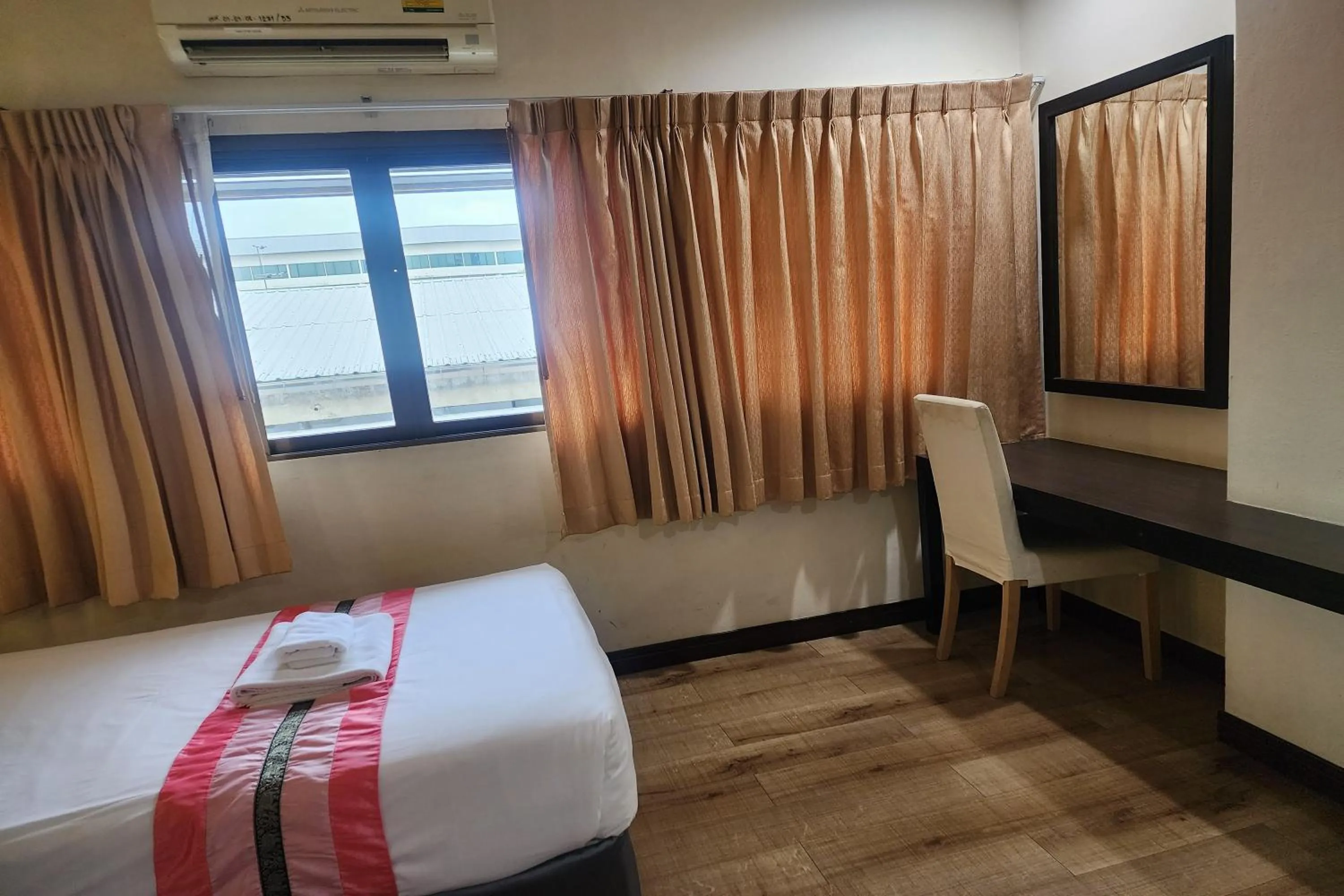 Bed in Suan Sunandha Palace Hotel