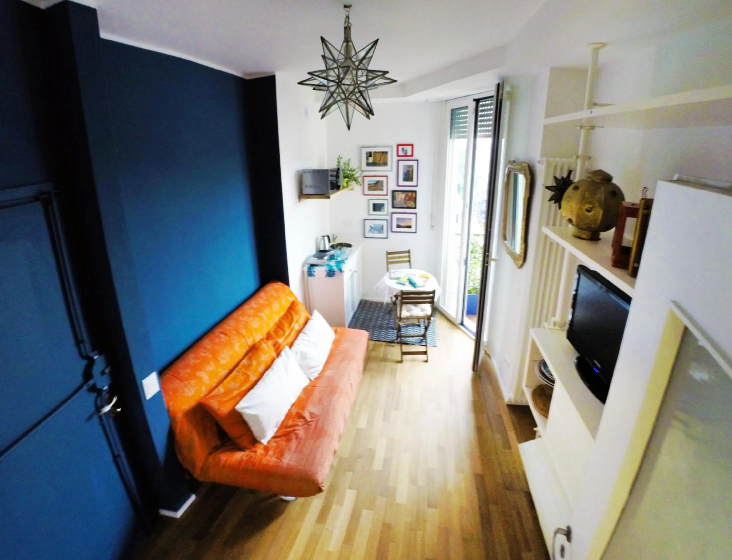 Seating area in Up to Seven