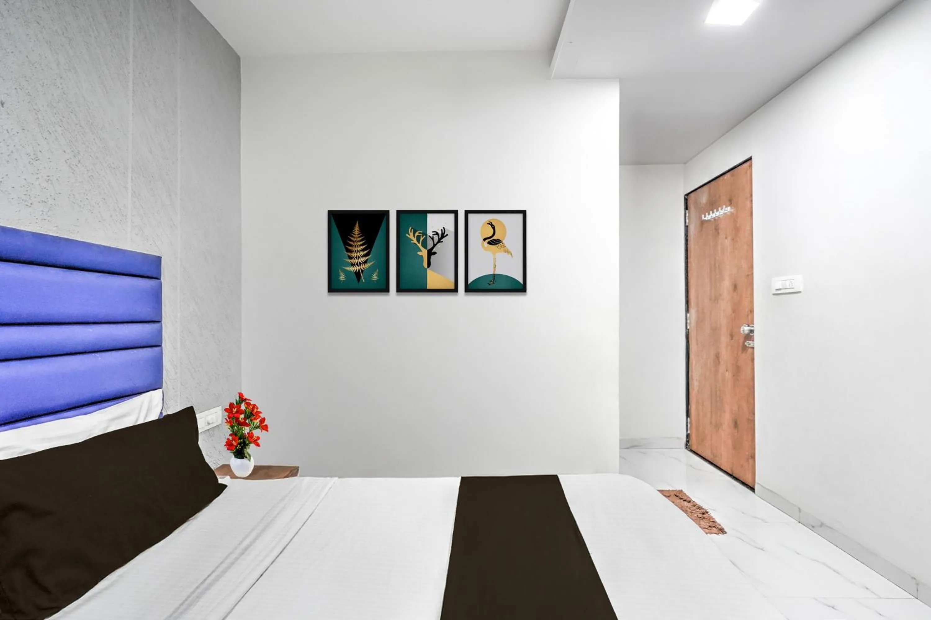 Bedroom, Bed in Hotel O Sneh Rashmi Botanical Garden Surat Formerly Stadium Plaza