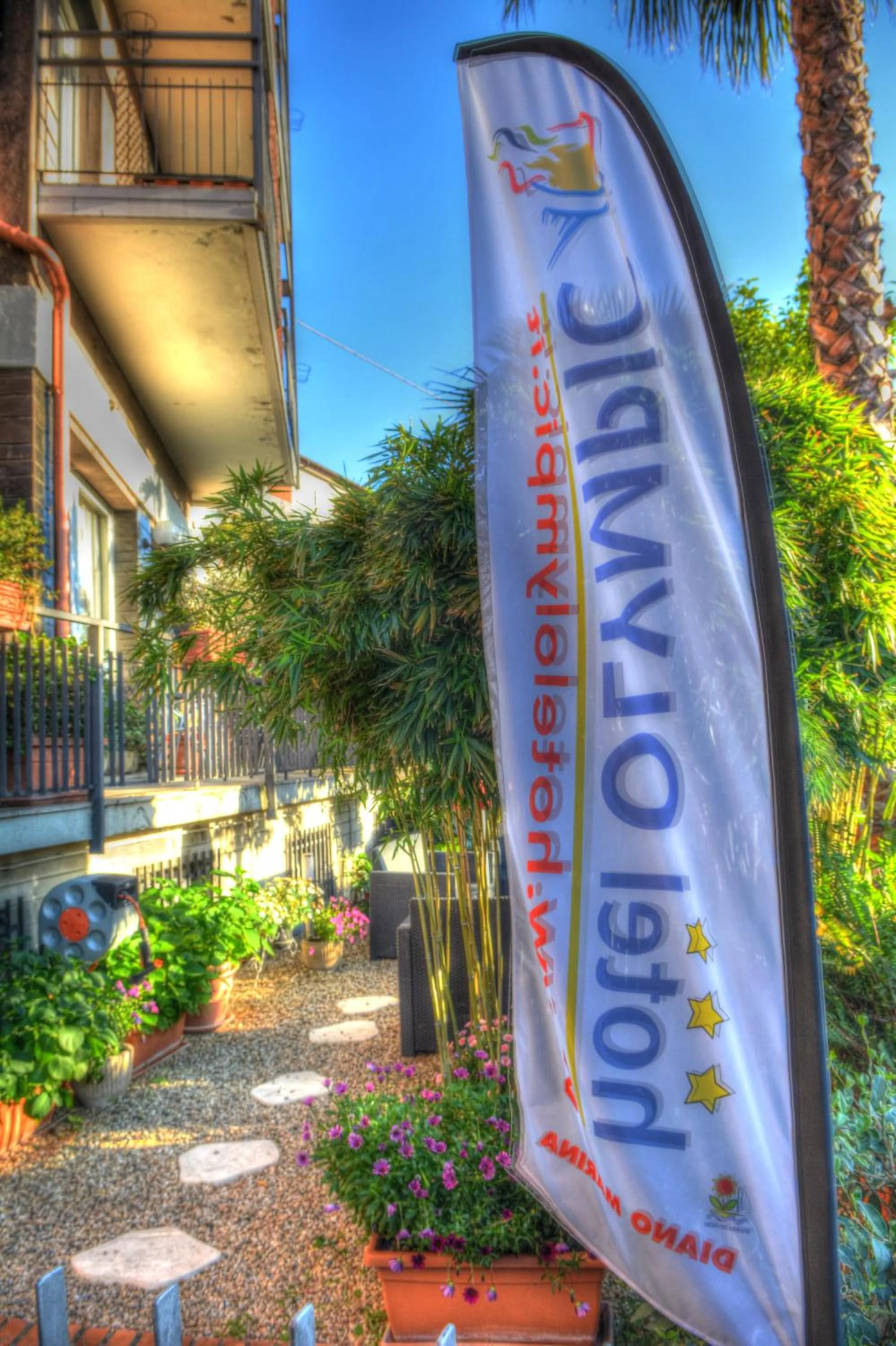 Property logo or sign in Hotel Olympic