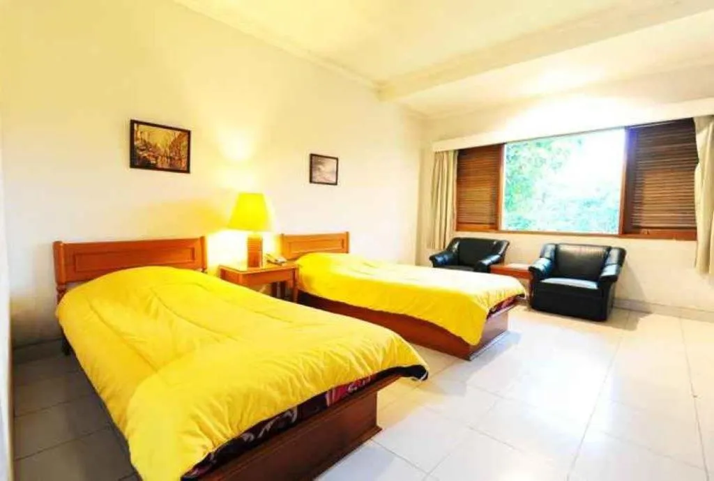 Bedroom, Bed in Graha Asri Hotel