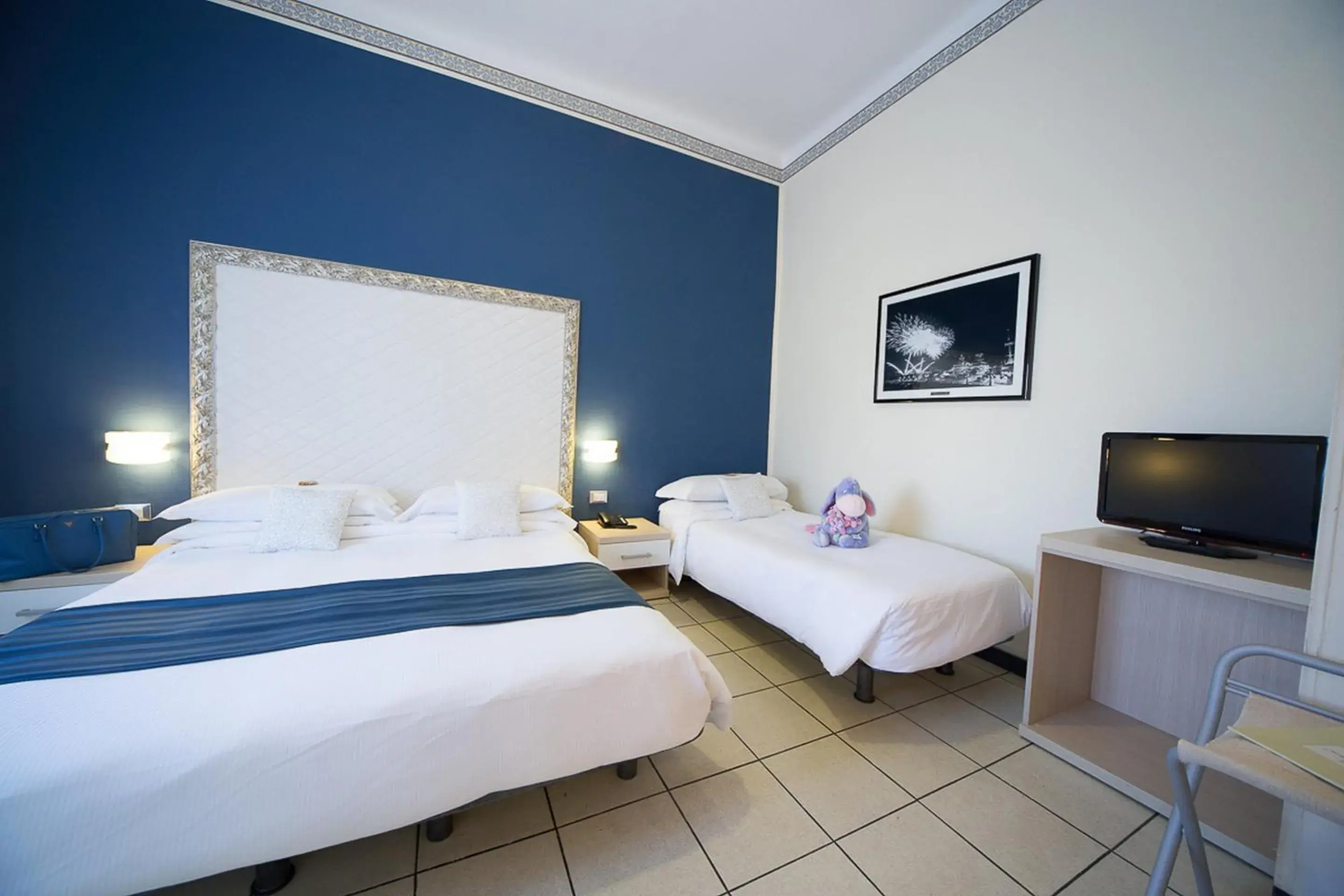 Triple Room in Hotel Villa Igea Mhotelsgroup Triple Room in Hotel Villa Igea Mhotelsgroup