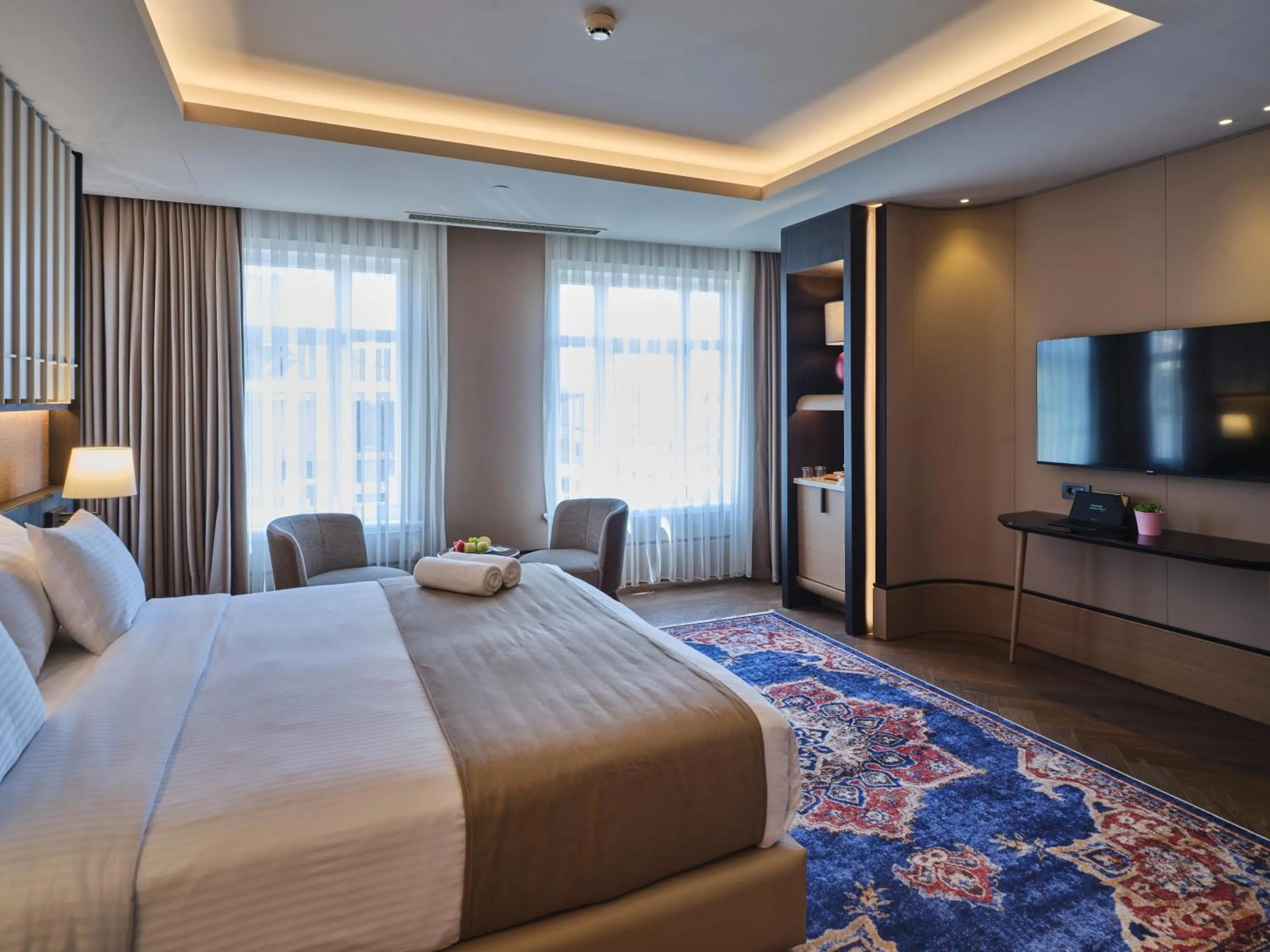 Bed in Four-G Hotel Premium