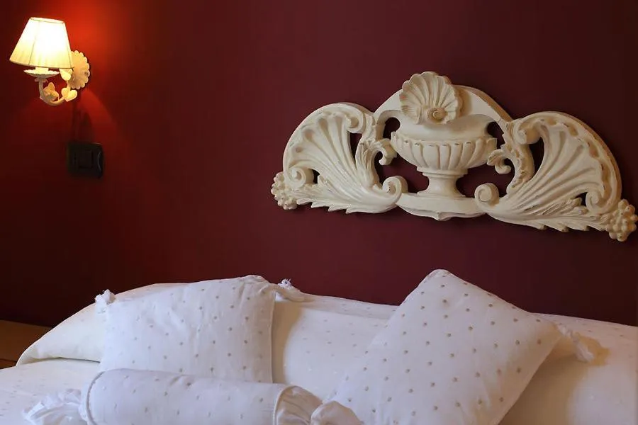 Decorative detail, Bed in Hotel Bergamo Mare Mhotelsgroup
