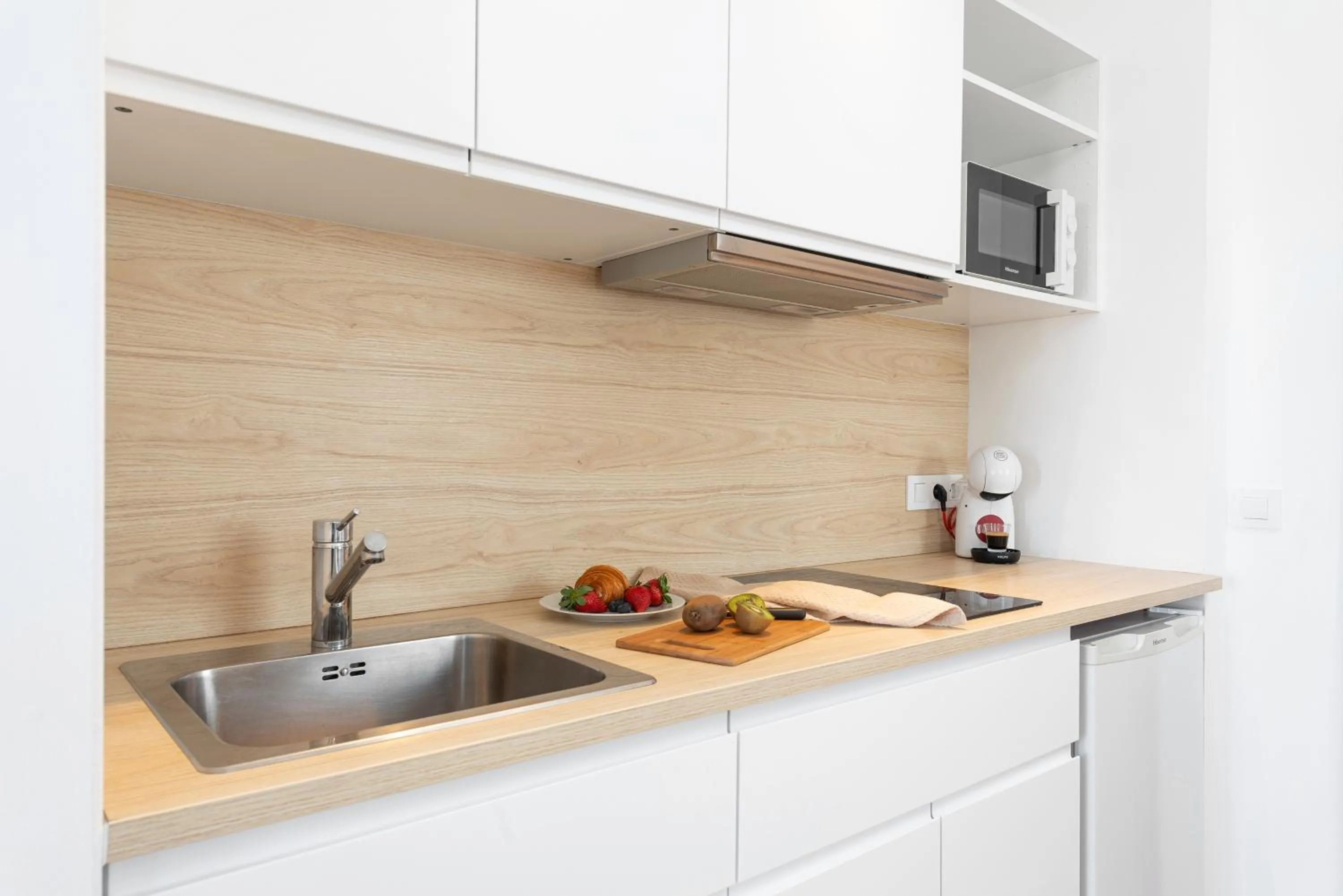 Kitchen or kitchenette in Bauló Mar Apartments