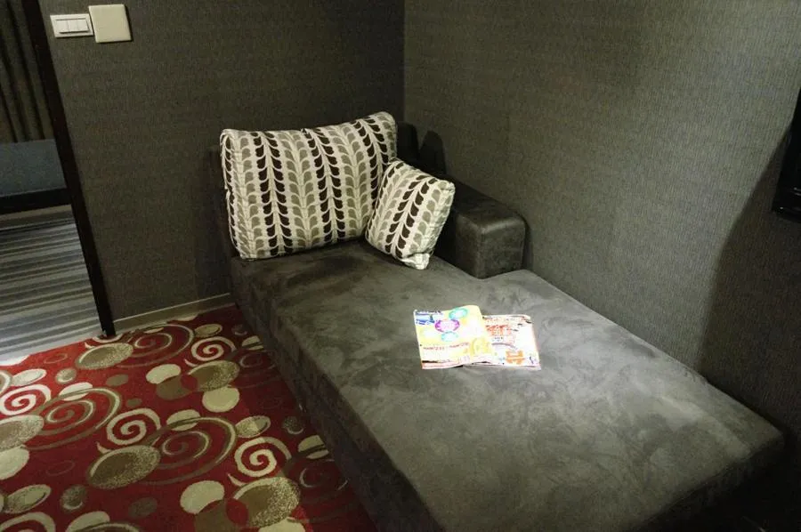 Seating area, Bed in Say Love Hotel