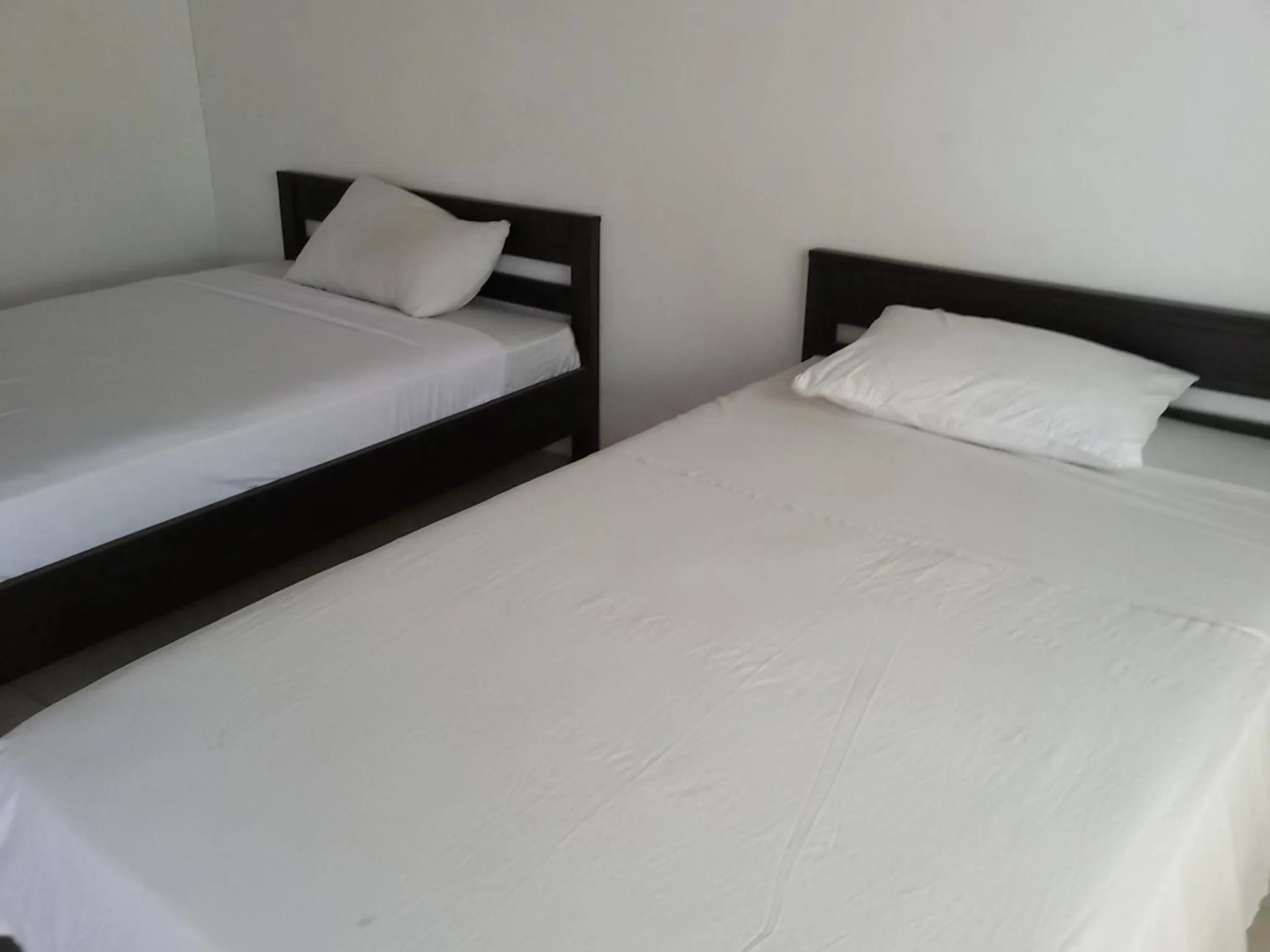 Photo of the whole room, Bed in Syifa Homestay