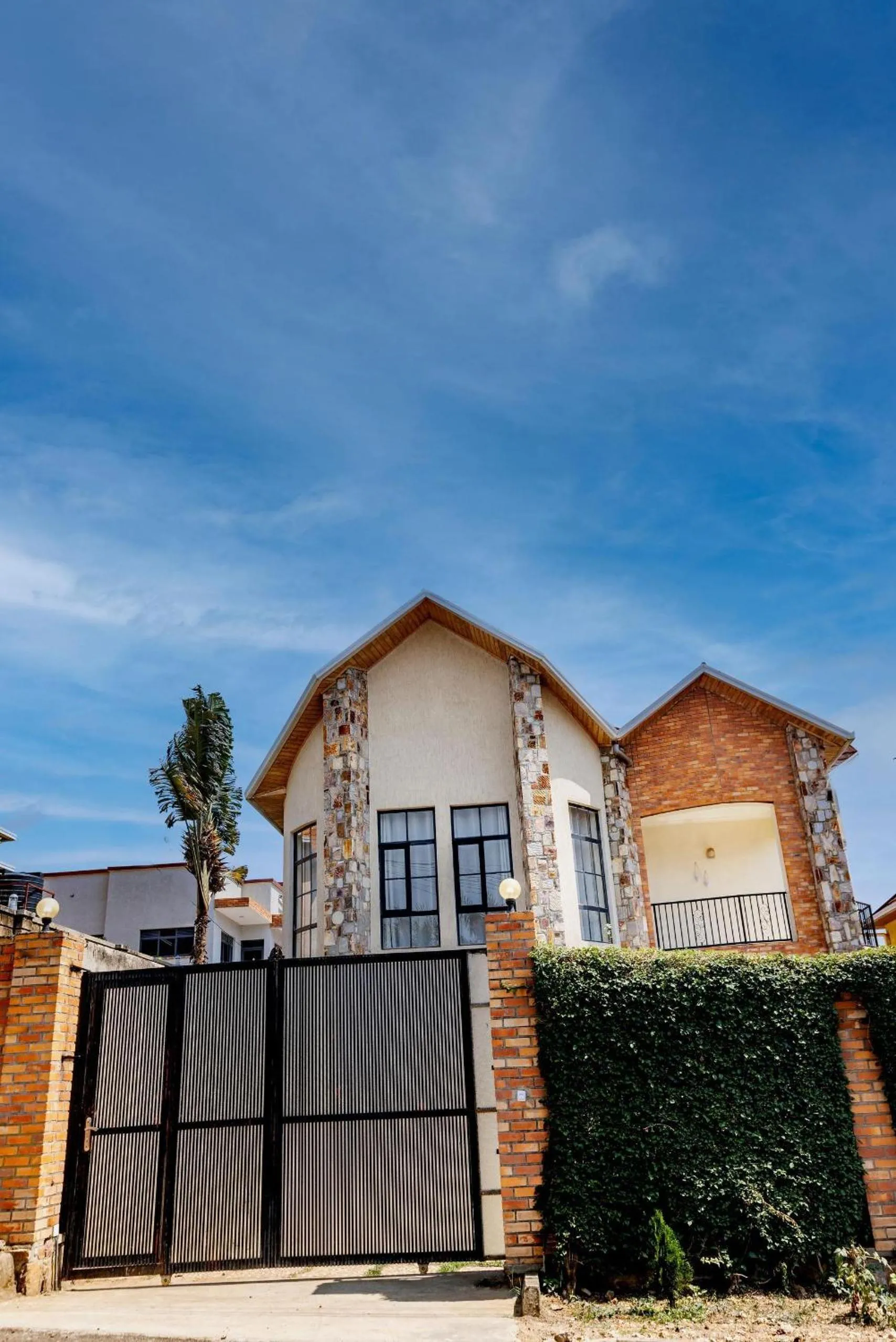 Property building in kigali Pillar House inn