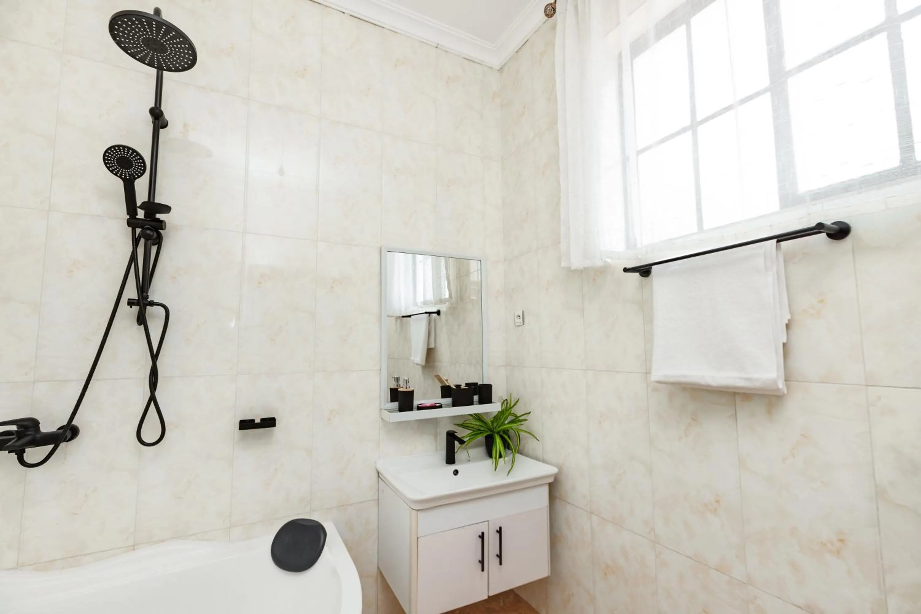 Shower in kigali Pillar House inn