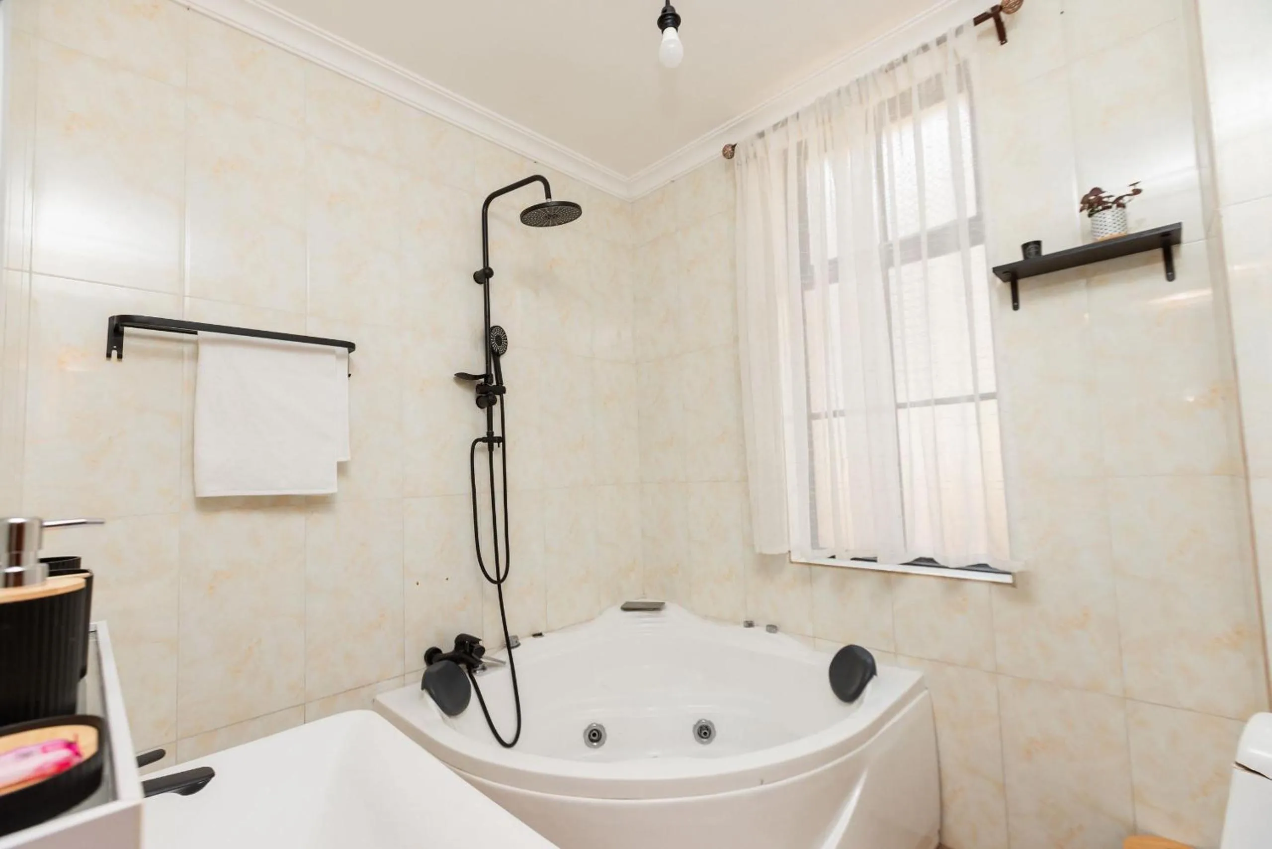 Shower in kigali Pillar House inn