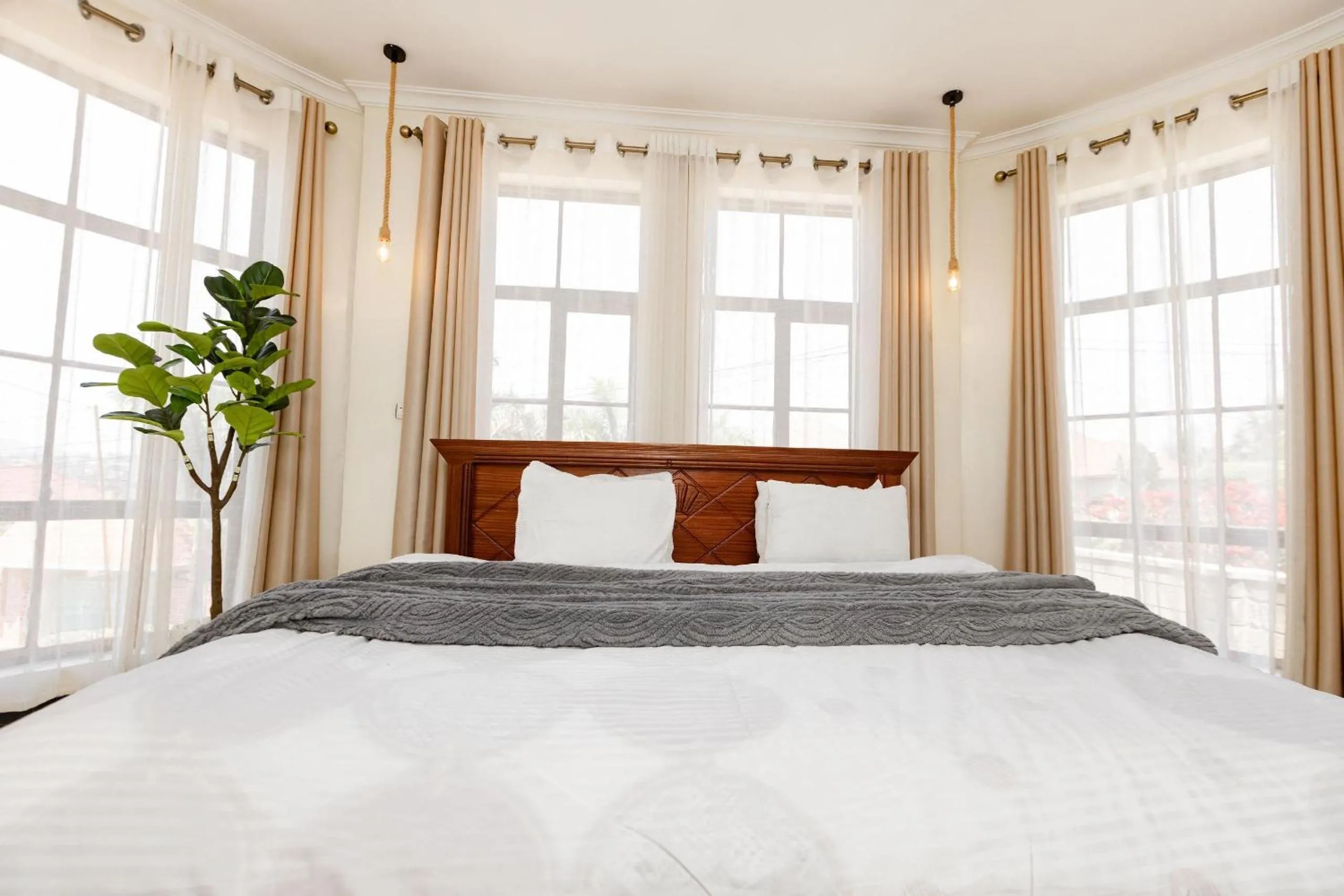 Photo of the whole room, Bed in kigali Pillar House inn