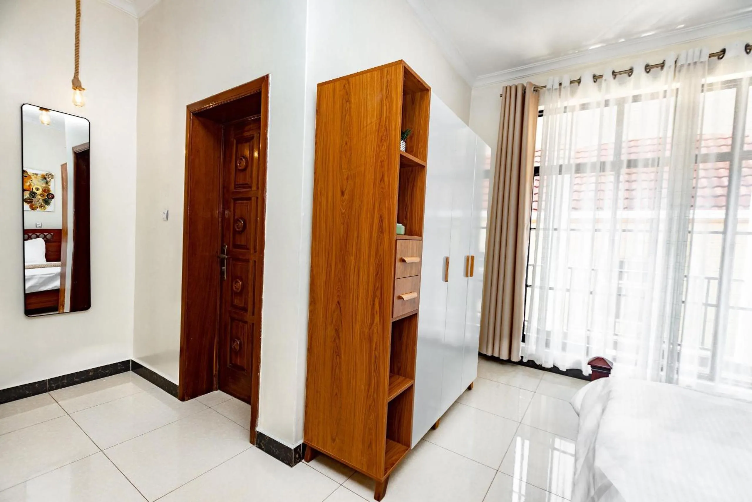 Photo of the whole room, Bed in kigali Pillar House inn