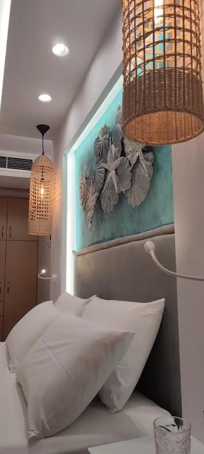 Bed in Ilianthos Apartments & Rooms