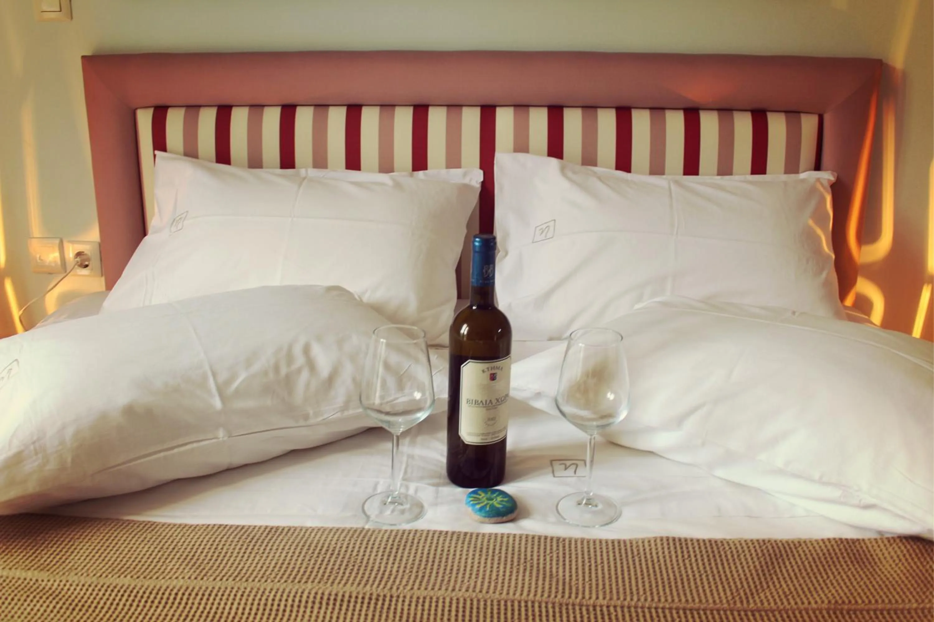 Decorative detail, Bed in Ilianthos Apartments & Rooms