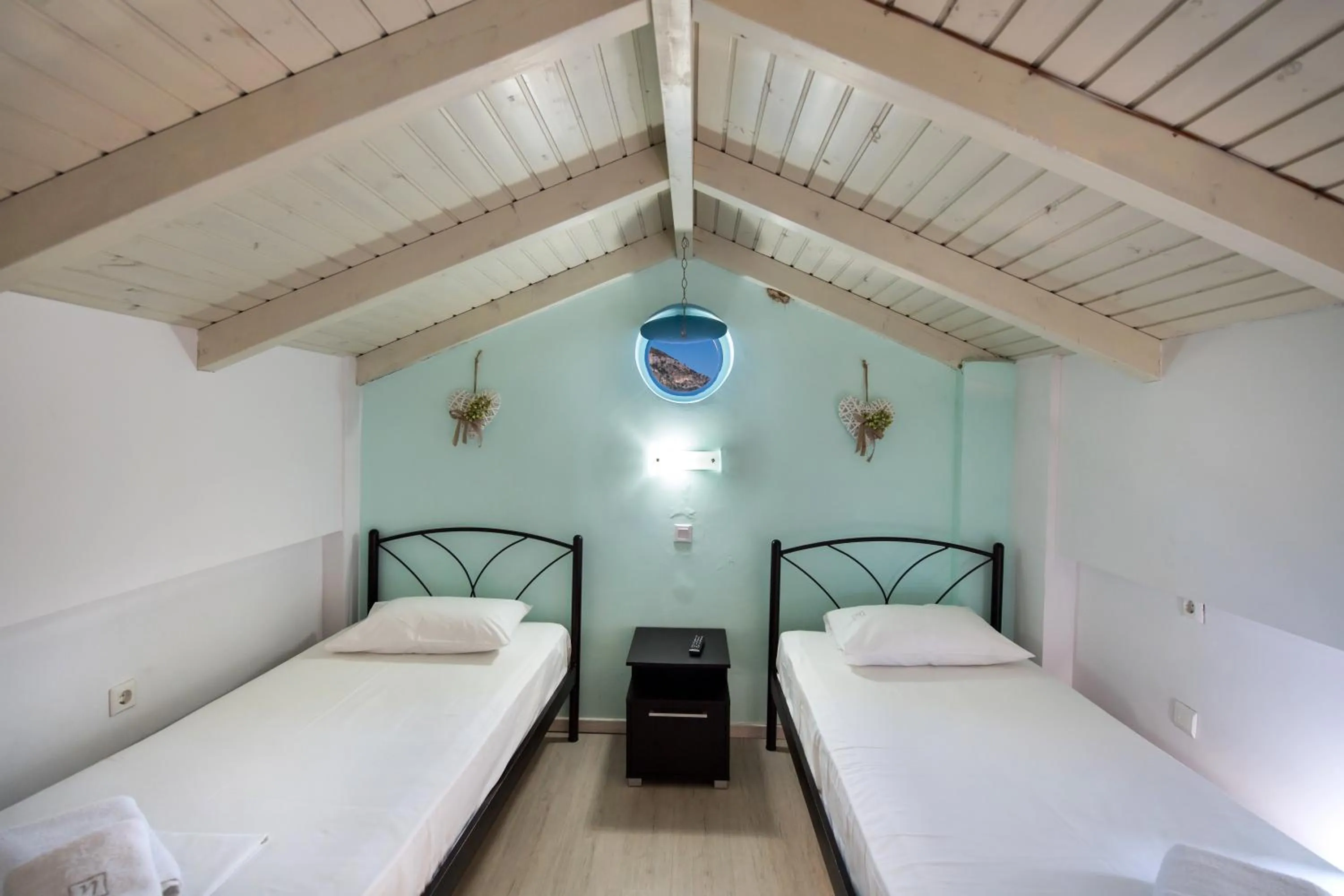 Bed in Ilianthos Apartments & Rooms