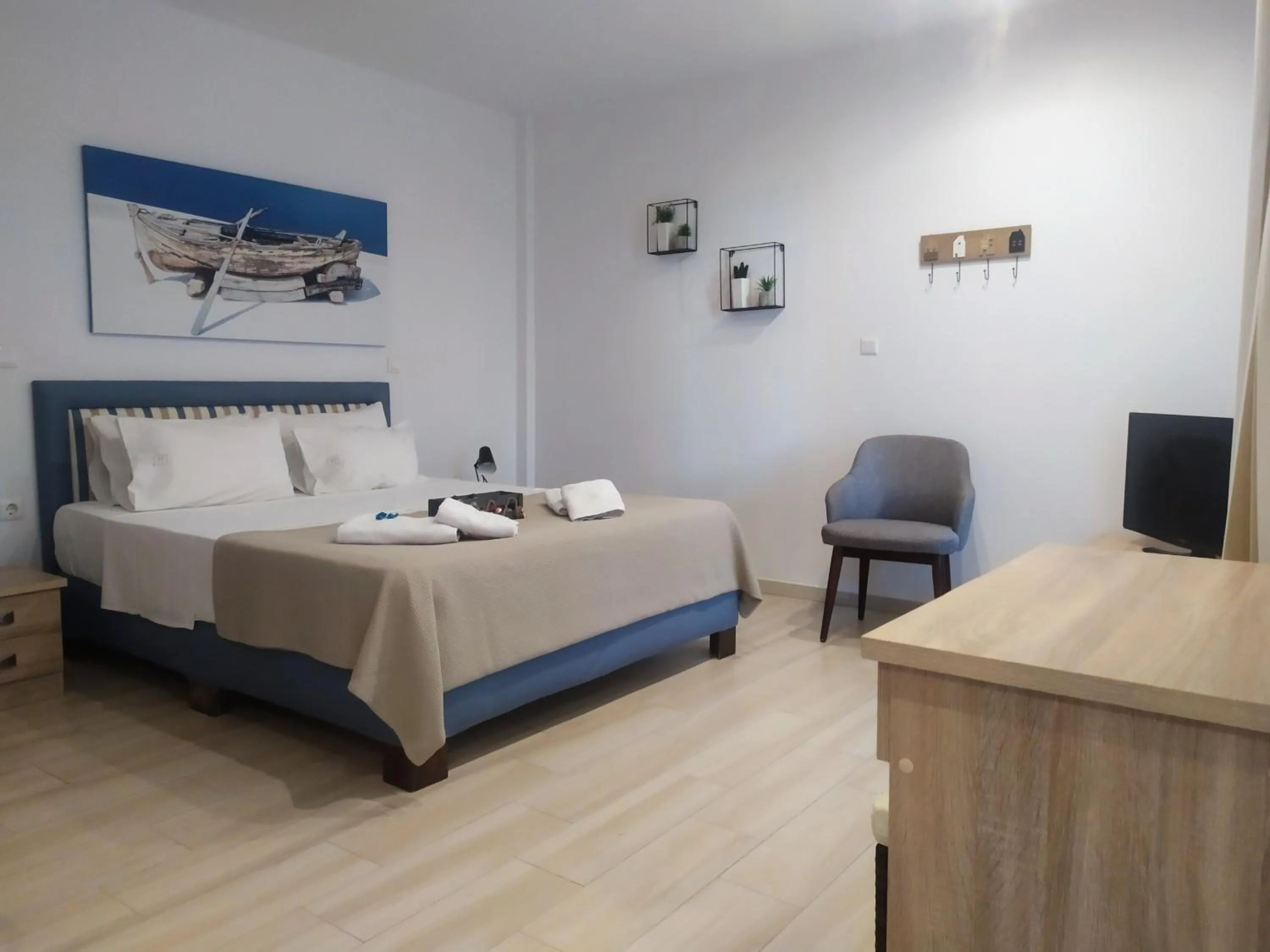 Bed in Ilianthos Apartments & Rooms