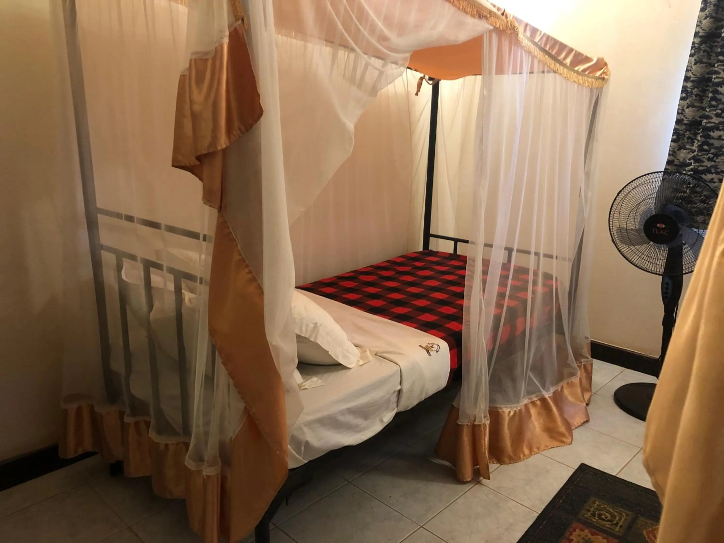 Bed in Impala Safari Lodge