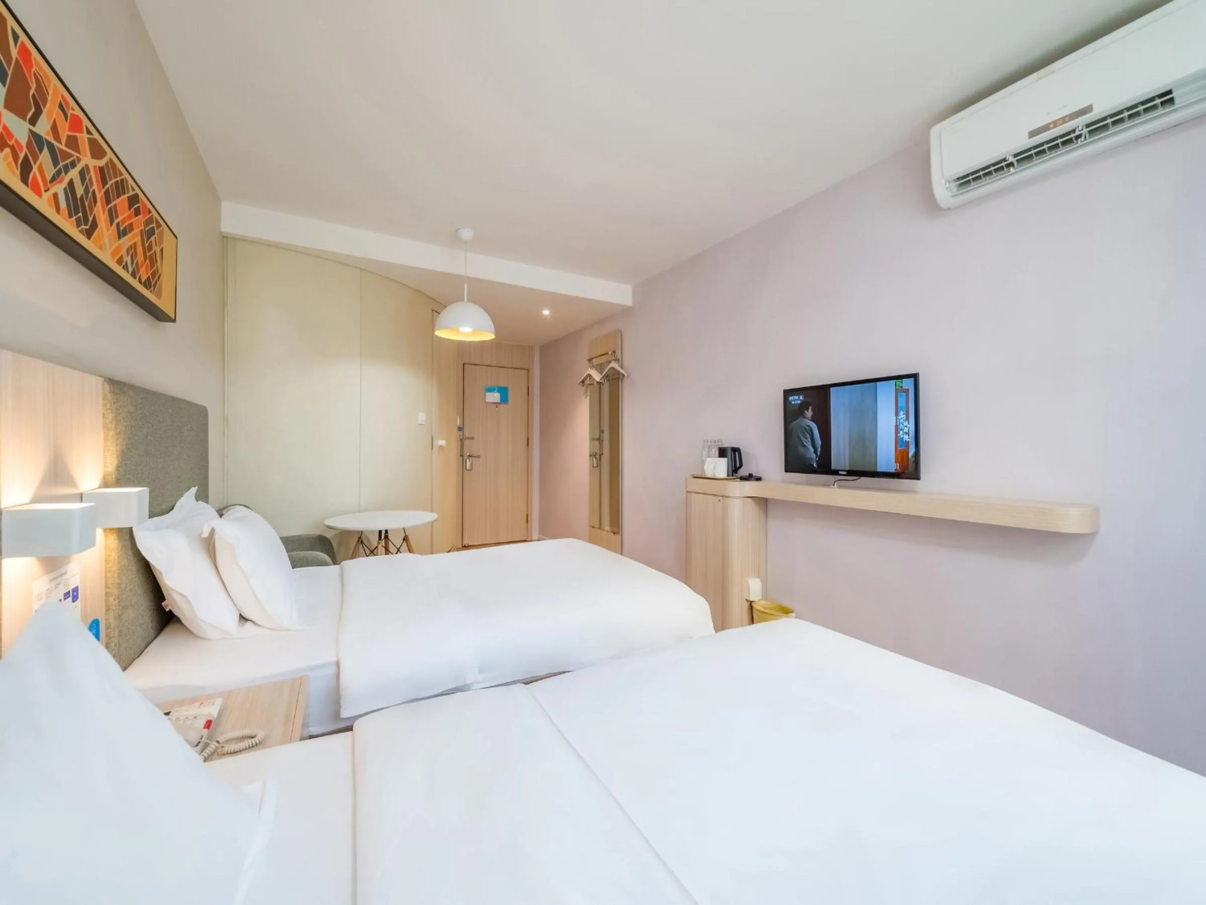 Bed in Hanting Hotel Beijing Guang'anmen Xuanwu Hospital