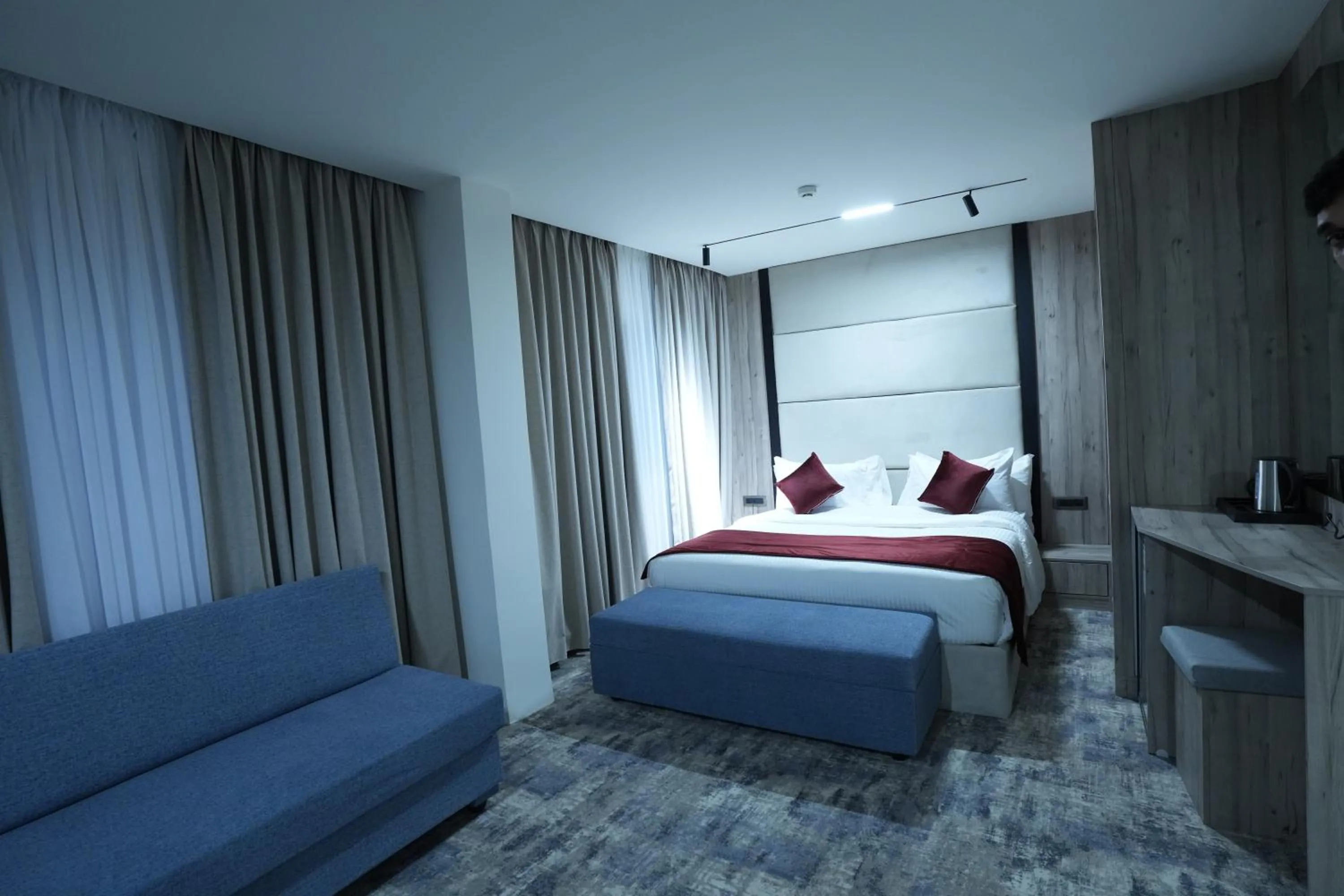 Bed in Roya Downtown Boutique Hotel
