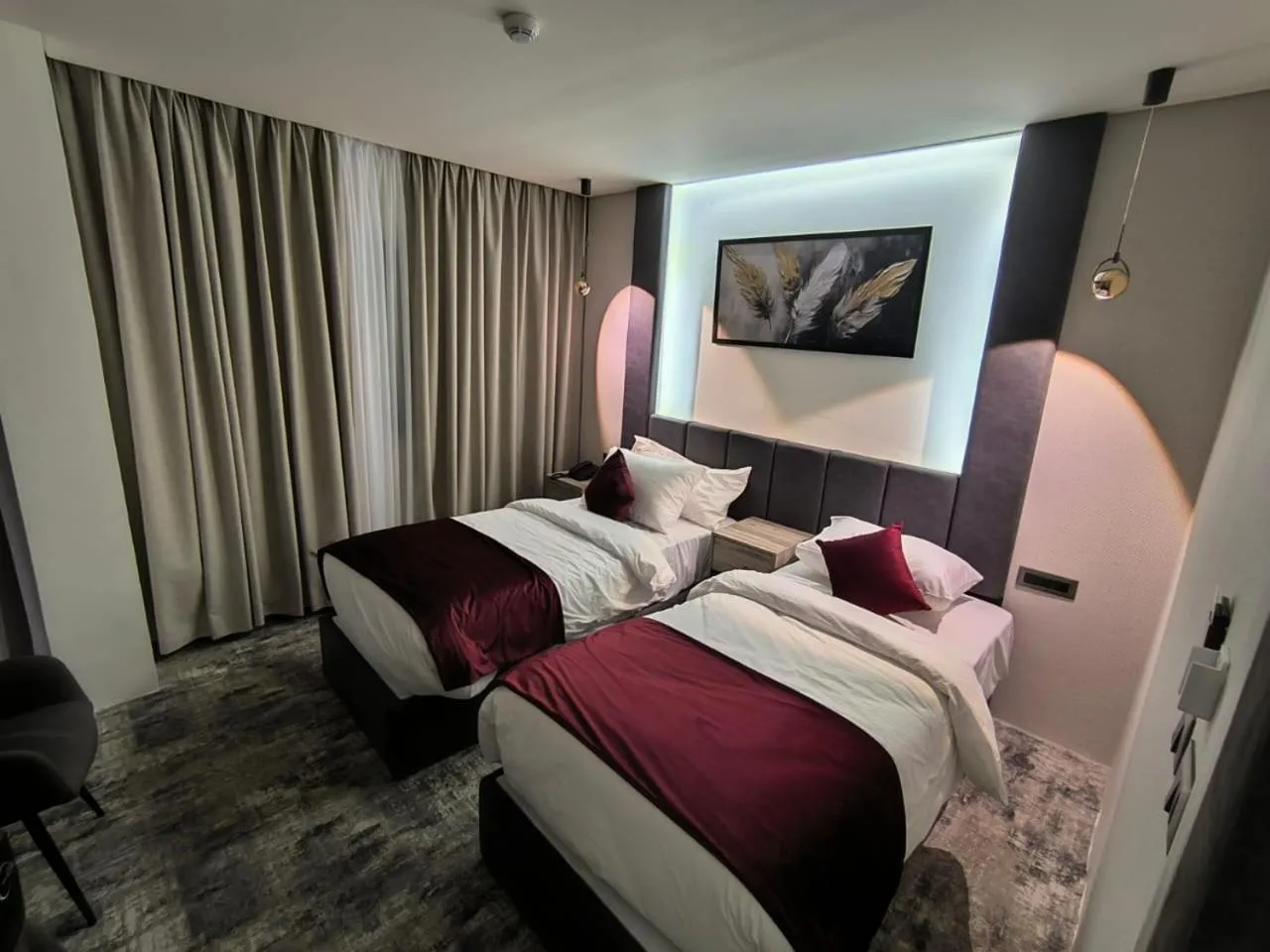 Bed in Roya Downtown Boutique Hotel