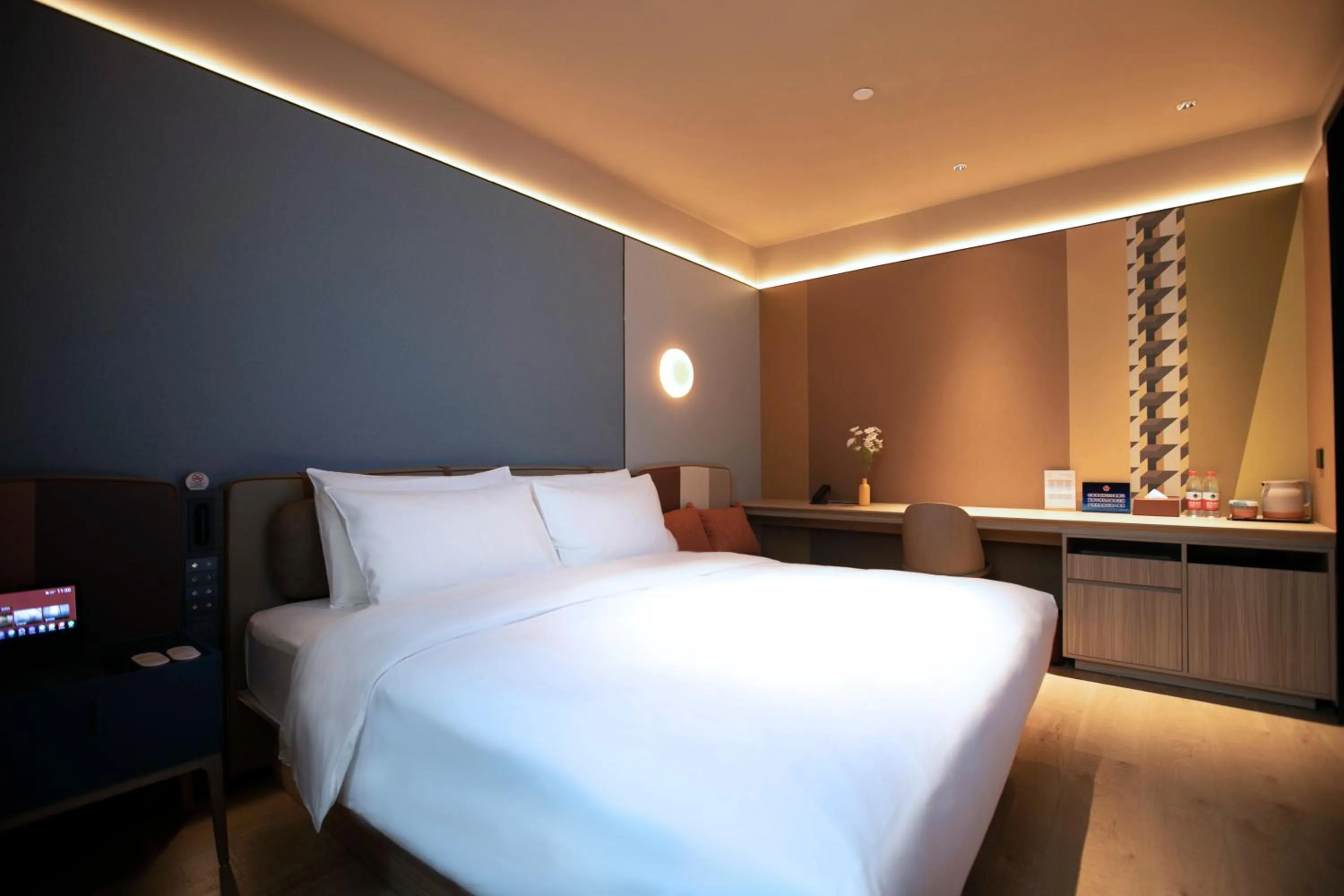 Bed in Orange Beijing Wukesong Shijingshan Wanda Plaza Hotel