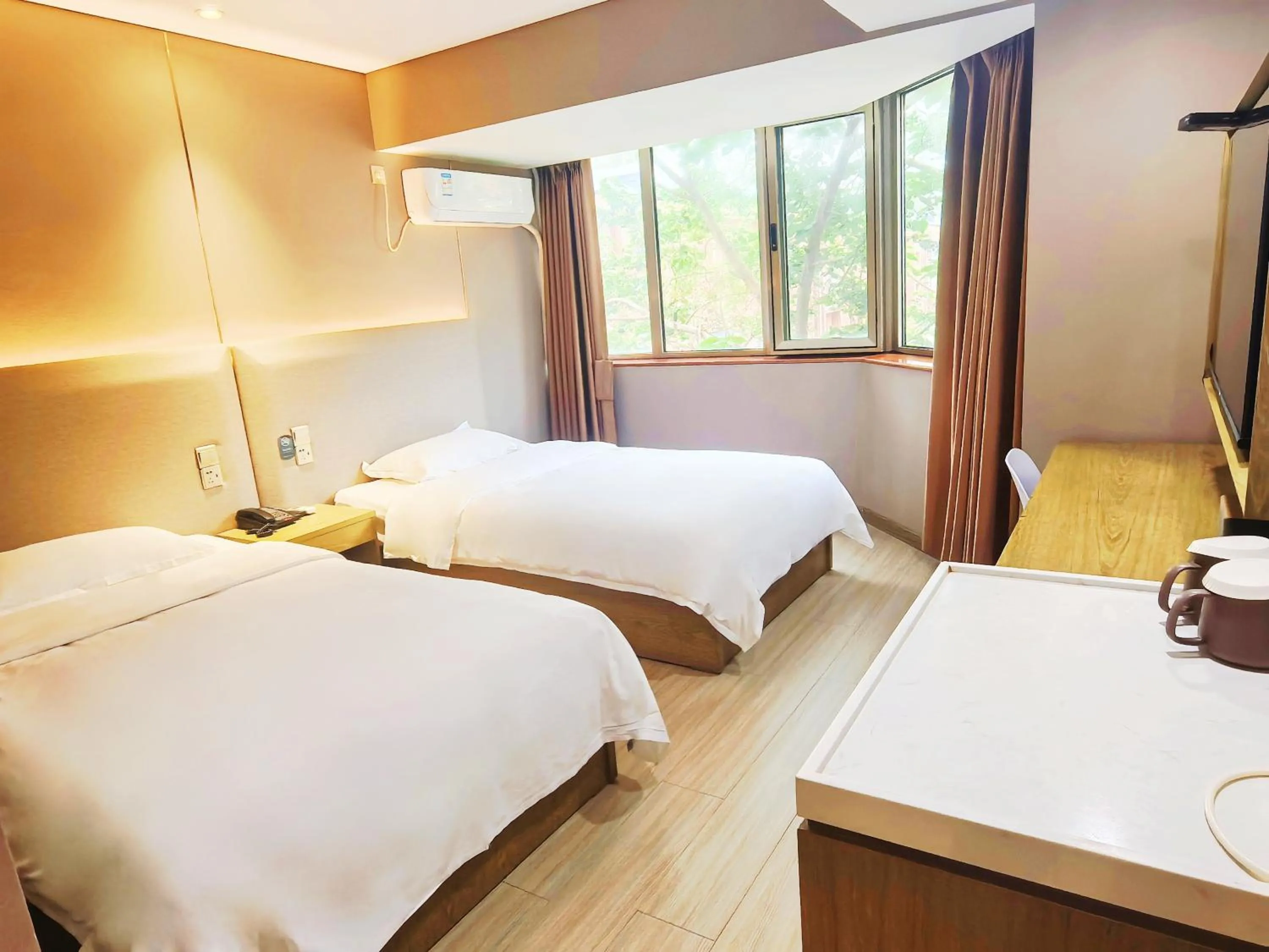 Bedroom in Hanting Hotel Beijing Fuchengmen Fuwai Hospital