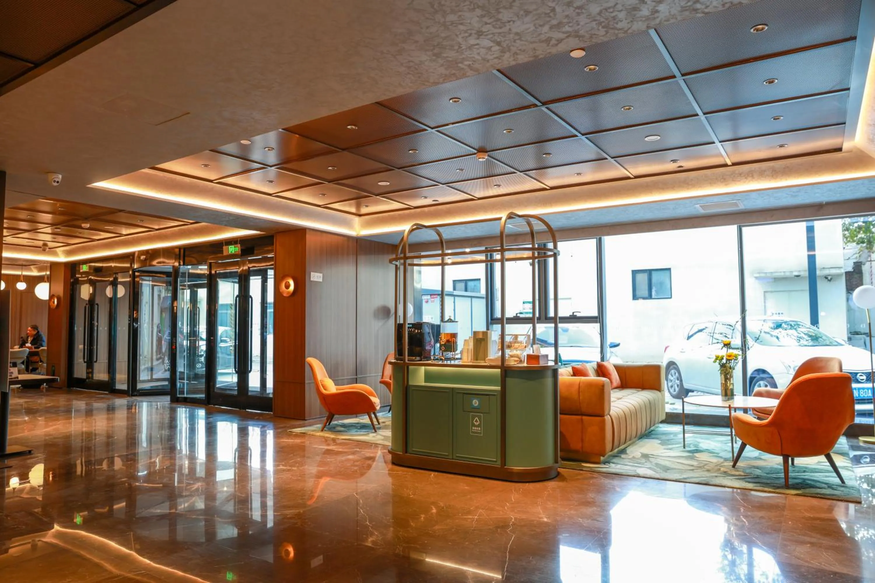 Seating area in Orange Beijing Wukesong Shijingshan Wanda Plaza Hotel